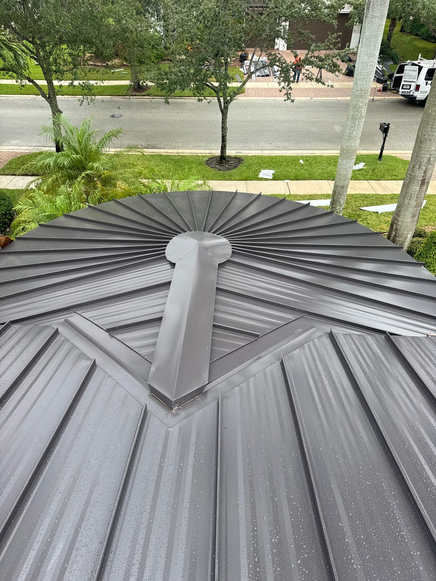 24ga 1.5" Mechanical Seam Dark Bronze by Total Roofing System The Metal Roof Experts