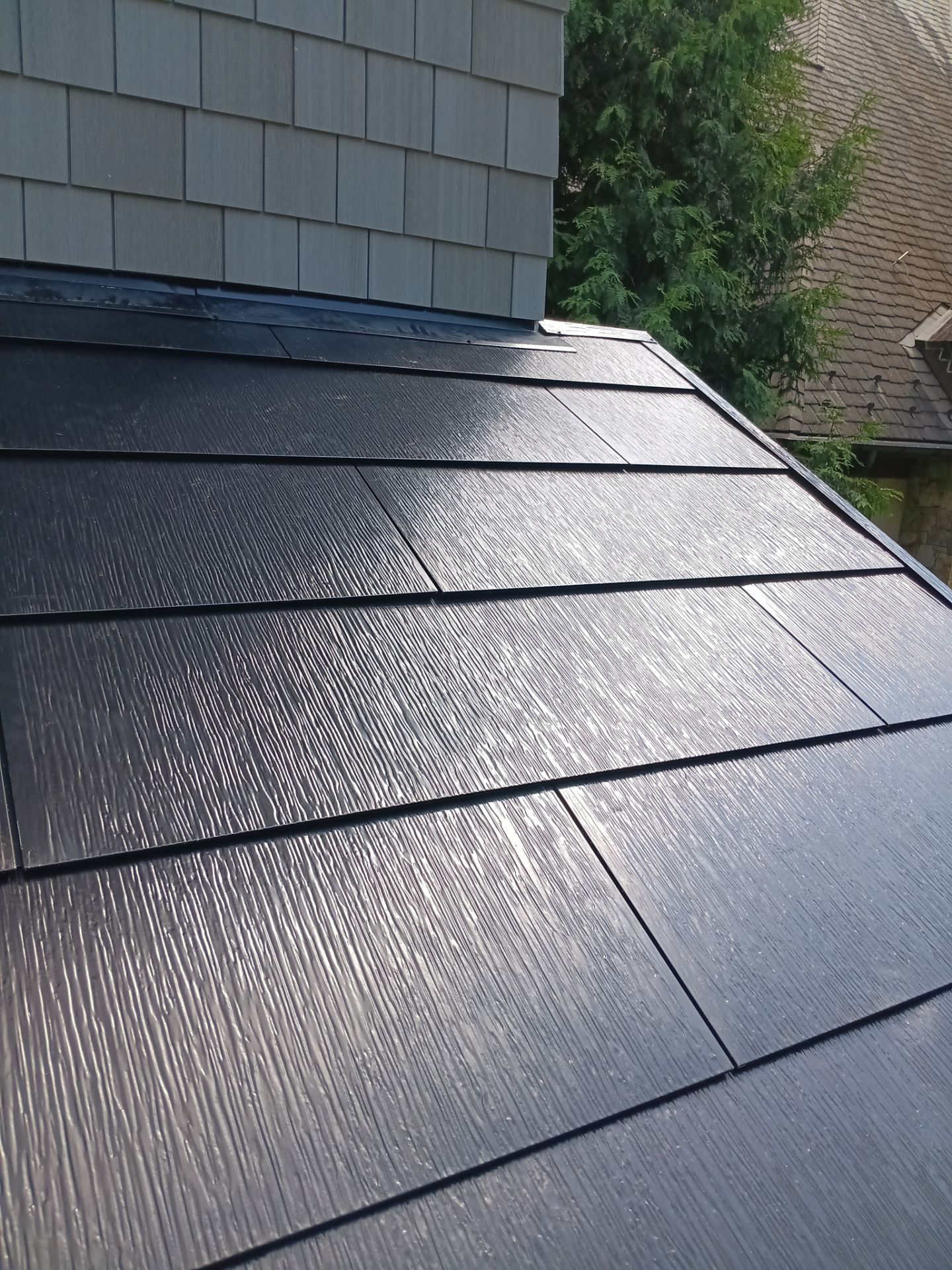 Tesla Solar Roof with Powerwall Storage by American Home Contractors
