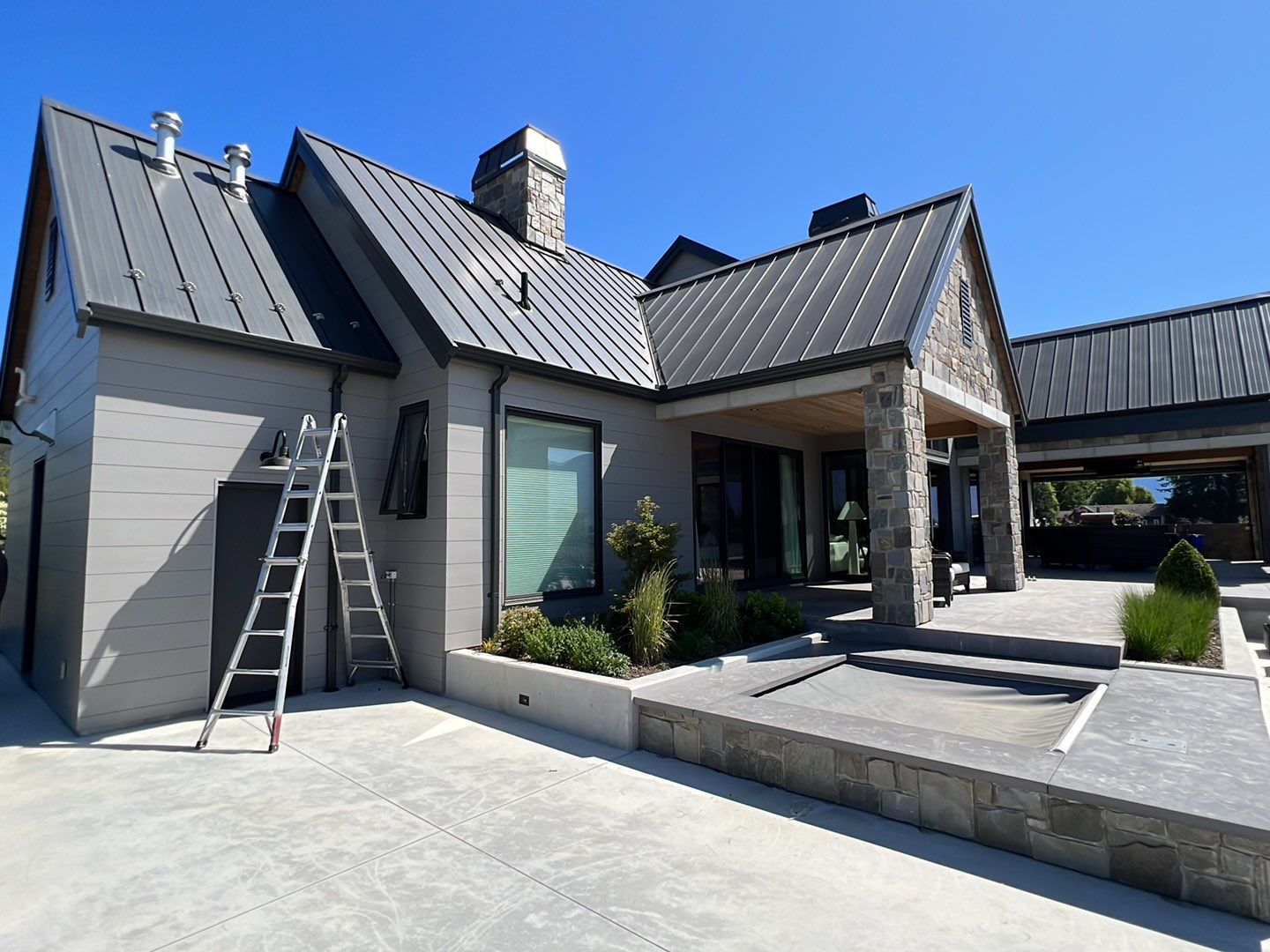 Residential Roofing Installation using 12" Prolok metal  by Top Notch Roofing Inc