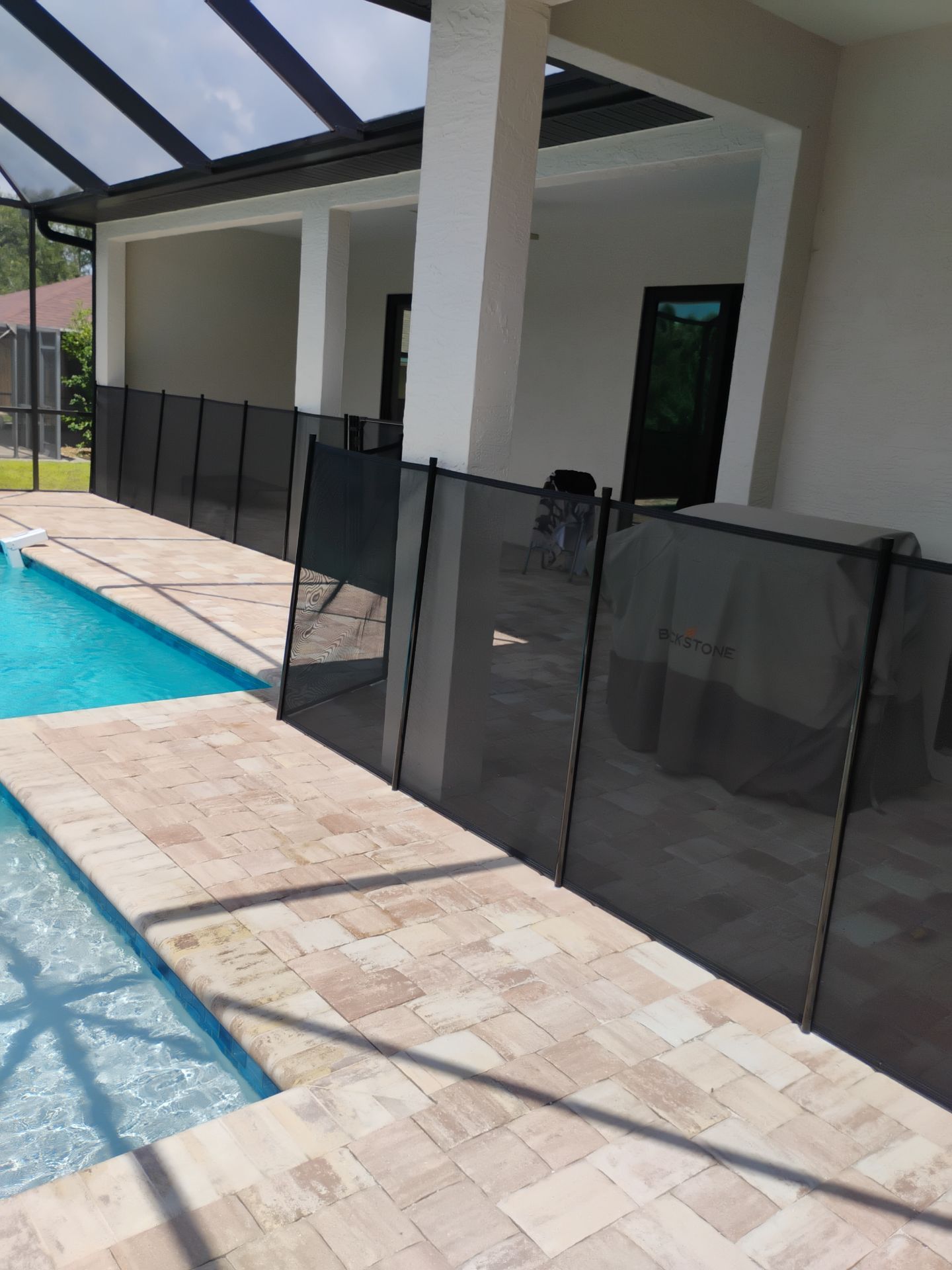 Vinyl Privacy Fencing and Aluminum Pool Security Installation in Port Charlotte by True Fence LLC