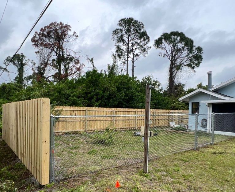 Wood Fence Installation using Wood and Chainlink Fence by Asap fence and gates, LLC