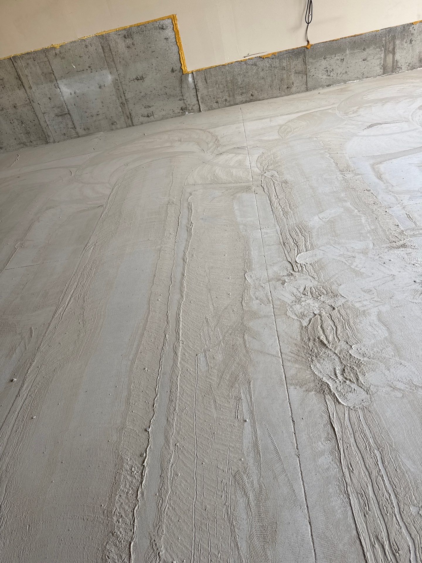 Custom Gray Speckled Polyaspartic Garage Floor Coating in Cheney by Croc Coatings, LLC