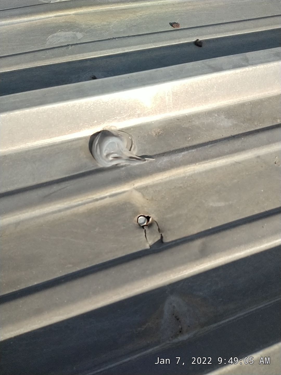 Commercial Roofing Installation using Aluminum Roofing panels by Hostetler Roofing