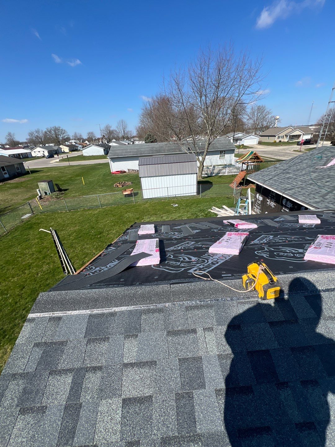 Storm Damage Residential Roof and Siding Installation by WIW Enterprises Inc