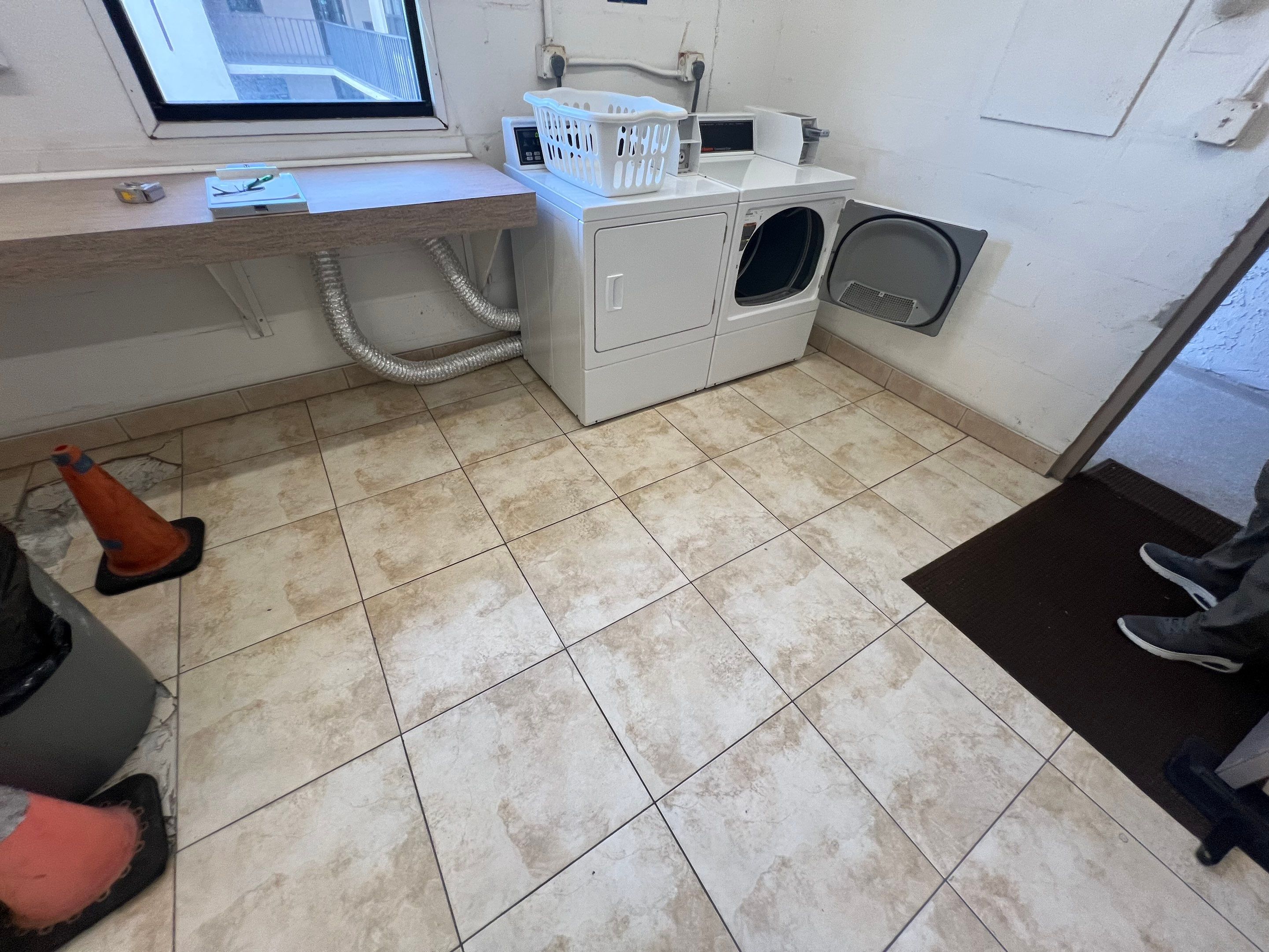 Laundry Tile Upgrade  by Vrmmm Flooring