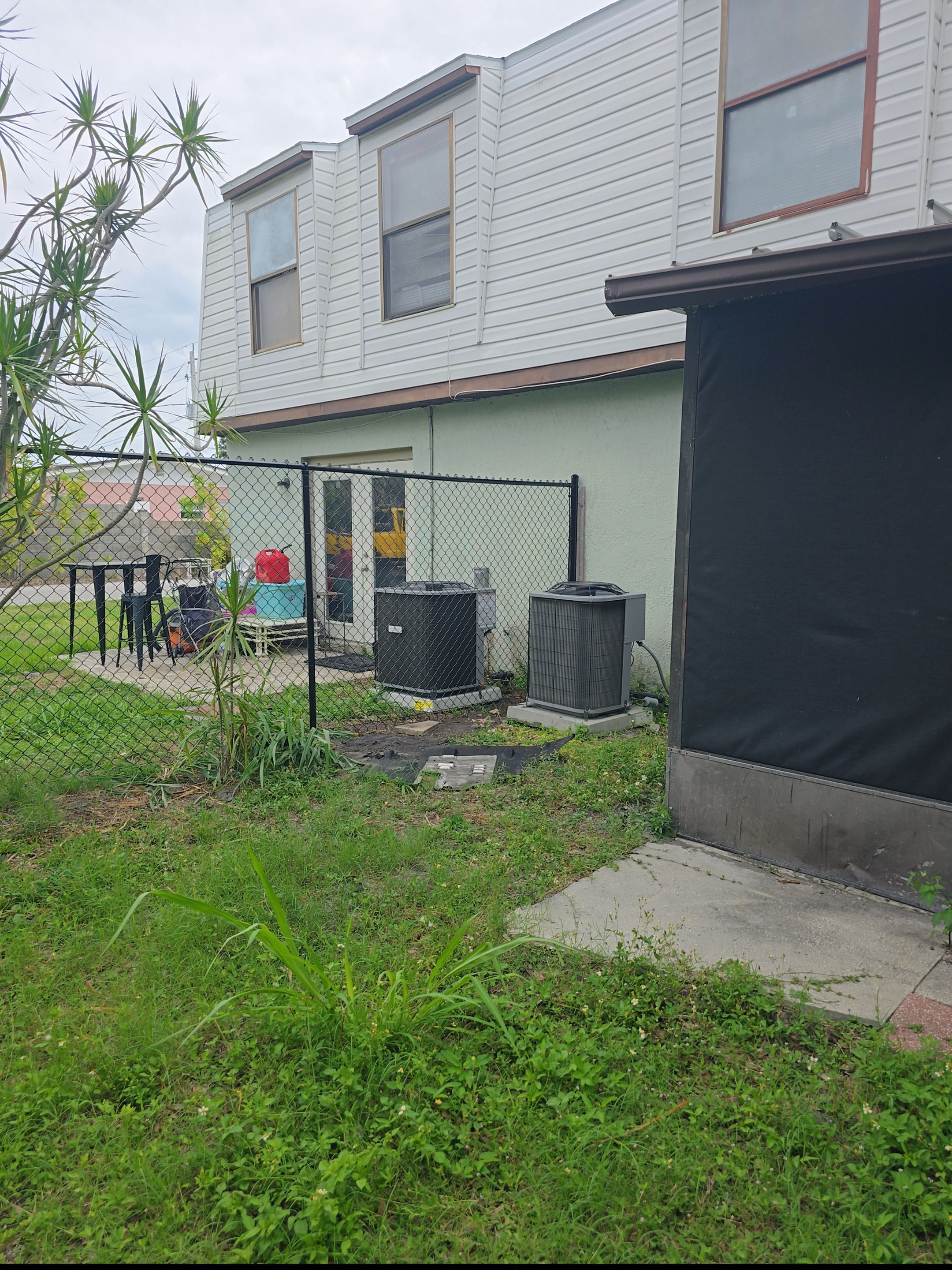 Black Vinyl Chain Link Fence Installation in Bradenton by True Fence LLC