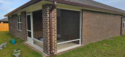 Screen Room Under Existing Roof in Milton