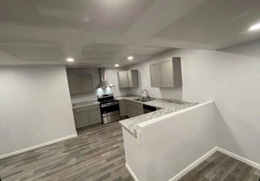 Full Basement Finishing by Greenspring Construction Services