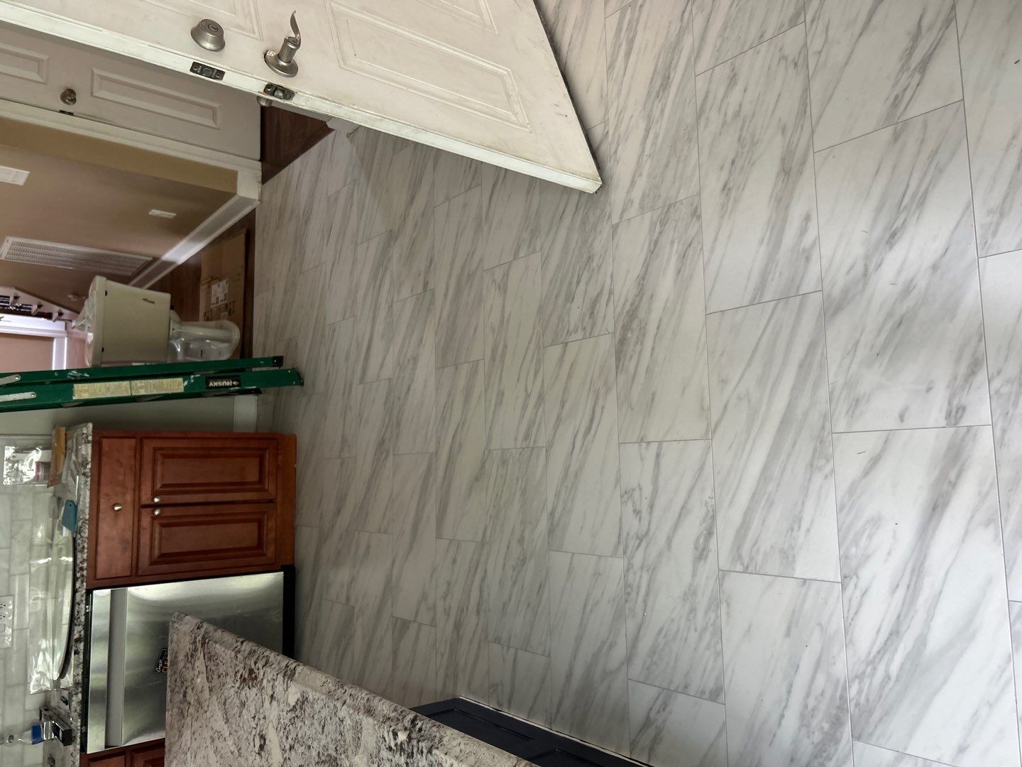 Kitchen floor refresh  by Footprints Floors of Nashville