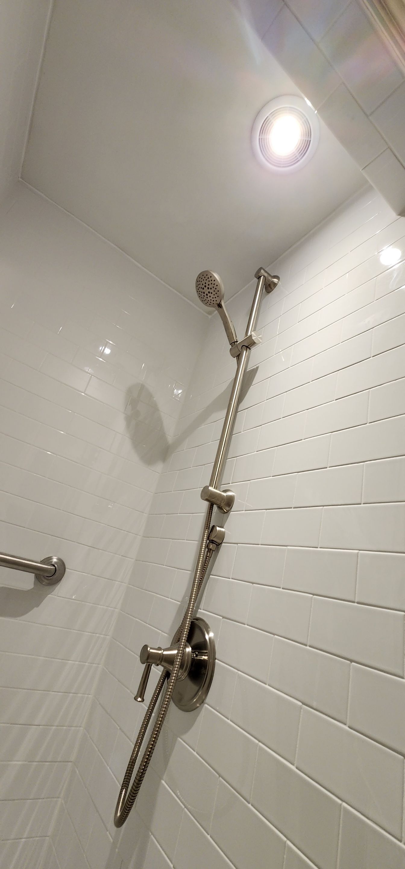 Full bathroom, tile shower, tile floor, tile wainscoting by The Shower Company