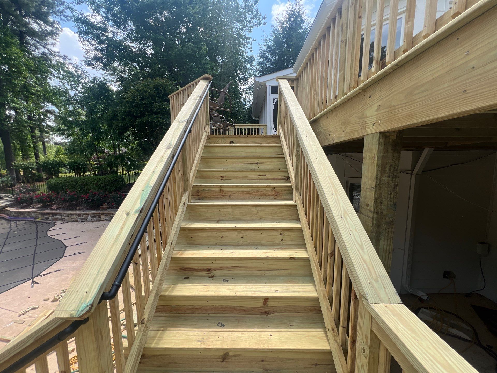 Multi-Level Pressure-Treated Wood Deck and Screened Porch in Acworth by Swift Home Renovations