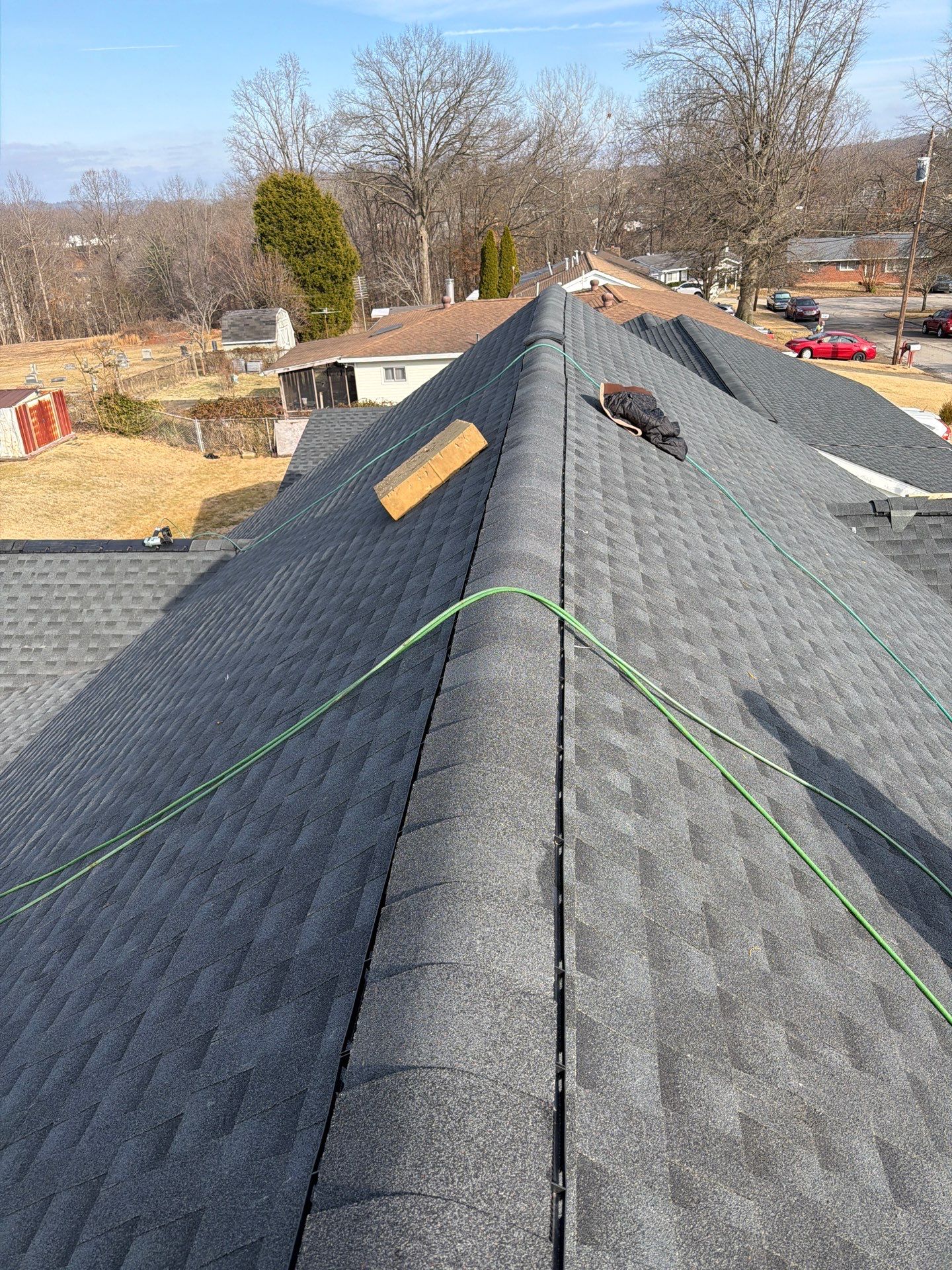 Residential Roofing Installation using GAF Timberline HDZ Charcoal by Rainstoppers Roofing