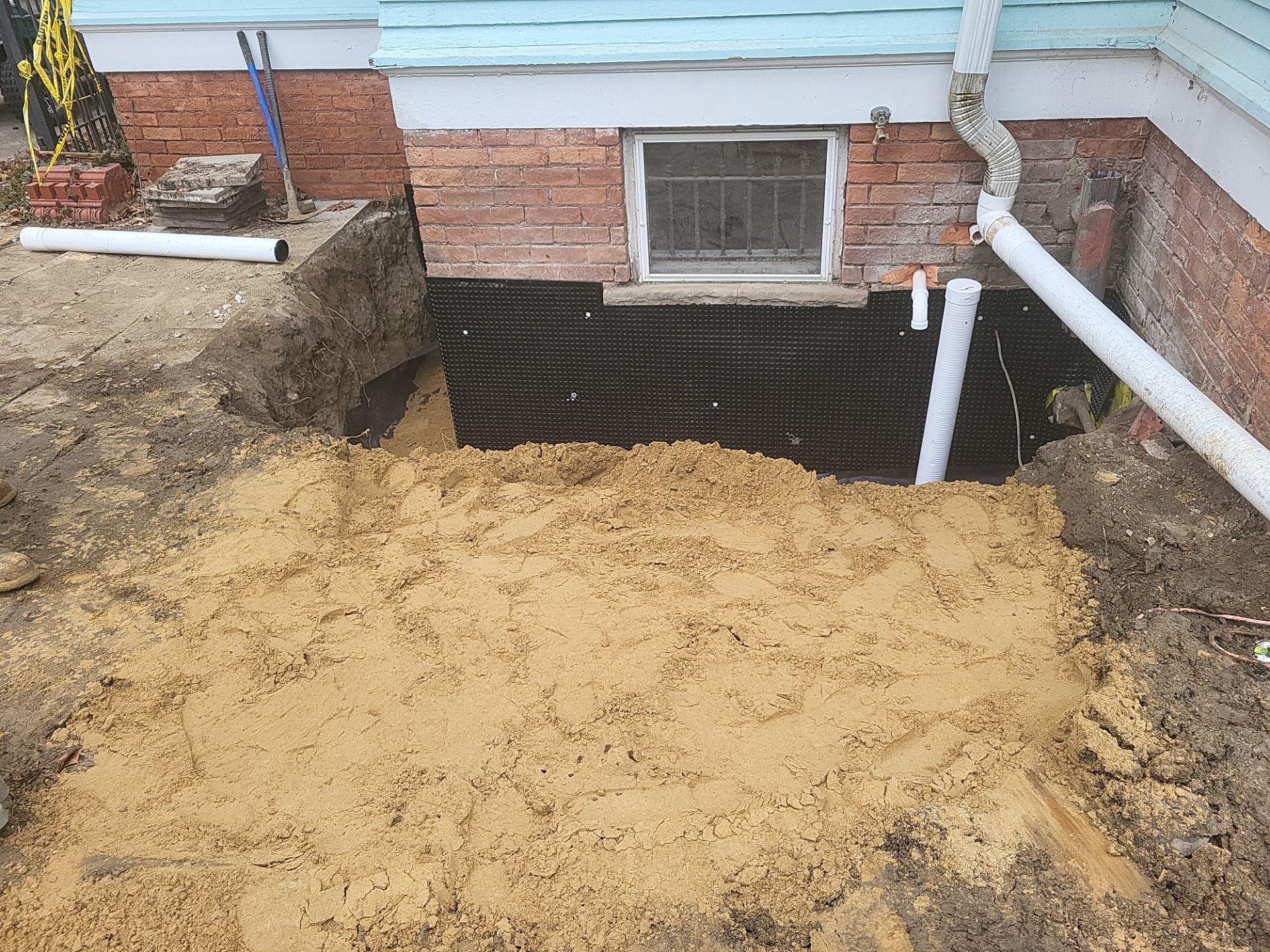 Exterior Basement Waterproofing & Combo Sump Backup System by Toledo Basement Repair