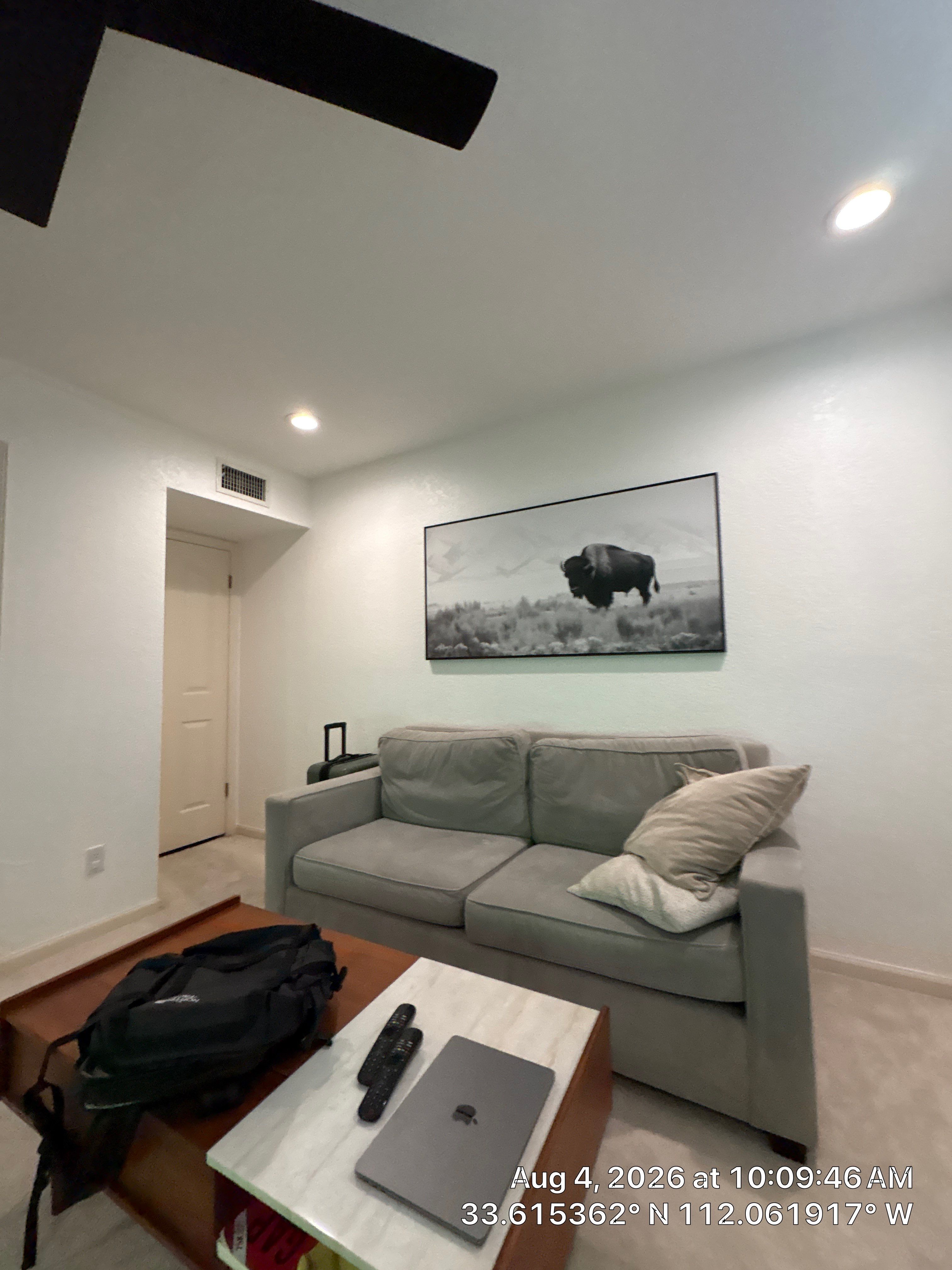 Custom Home Office Setup Featuring Arched Plantation Shutters and Accent Wall by CompanyCam Sales Demo