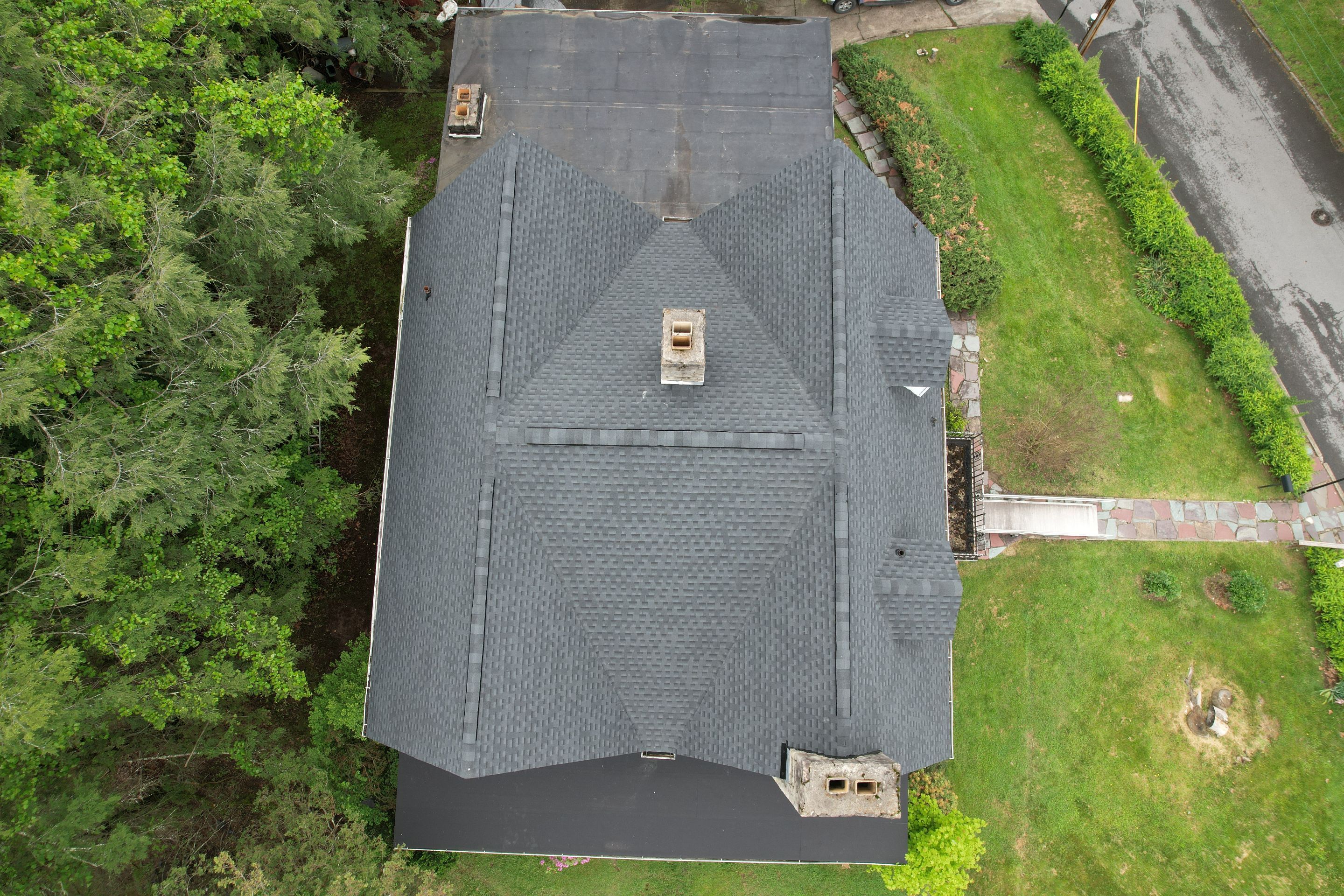 Residential Roofing Installation using GAF Timberline HDZ Charcoal by Rainstoppers Roofing