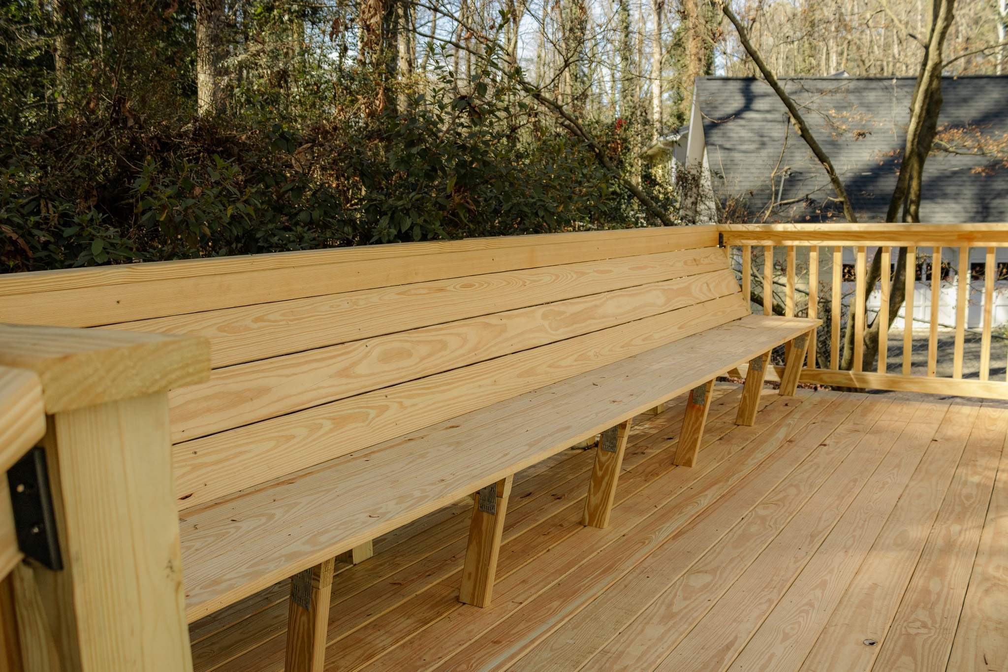 Deck Resurface with Wood Bench Install Using Pressure Treated Pine by Nelson Exteriors 