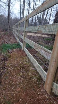 Fence Installation of 4 Rail Ranch Fence with Welded Wire