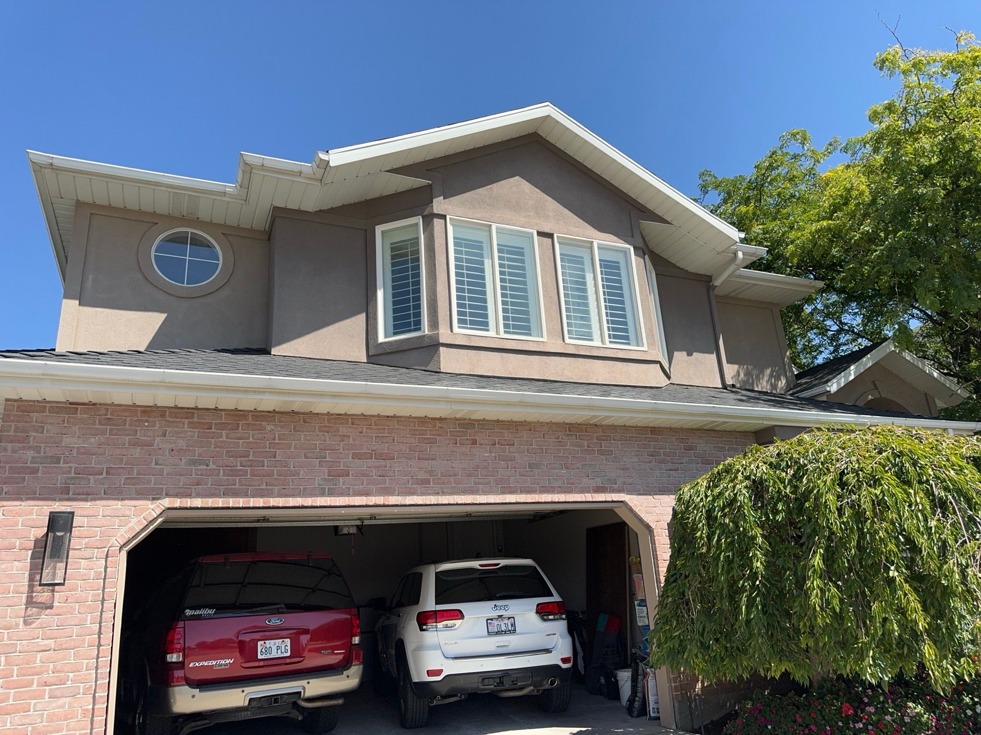 Centerville | High-End Stucco Conversion Accent | Walnut Cedar & Primed B&B by Ideal Siding Utah