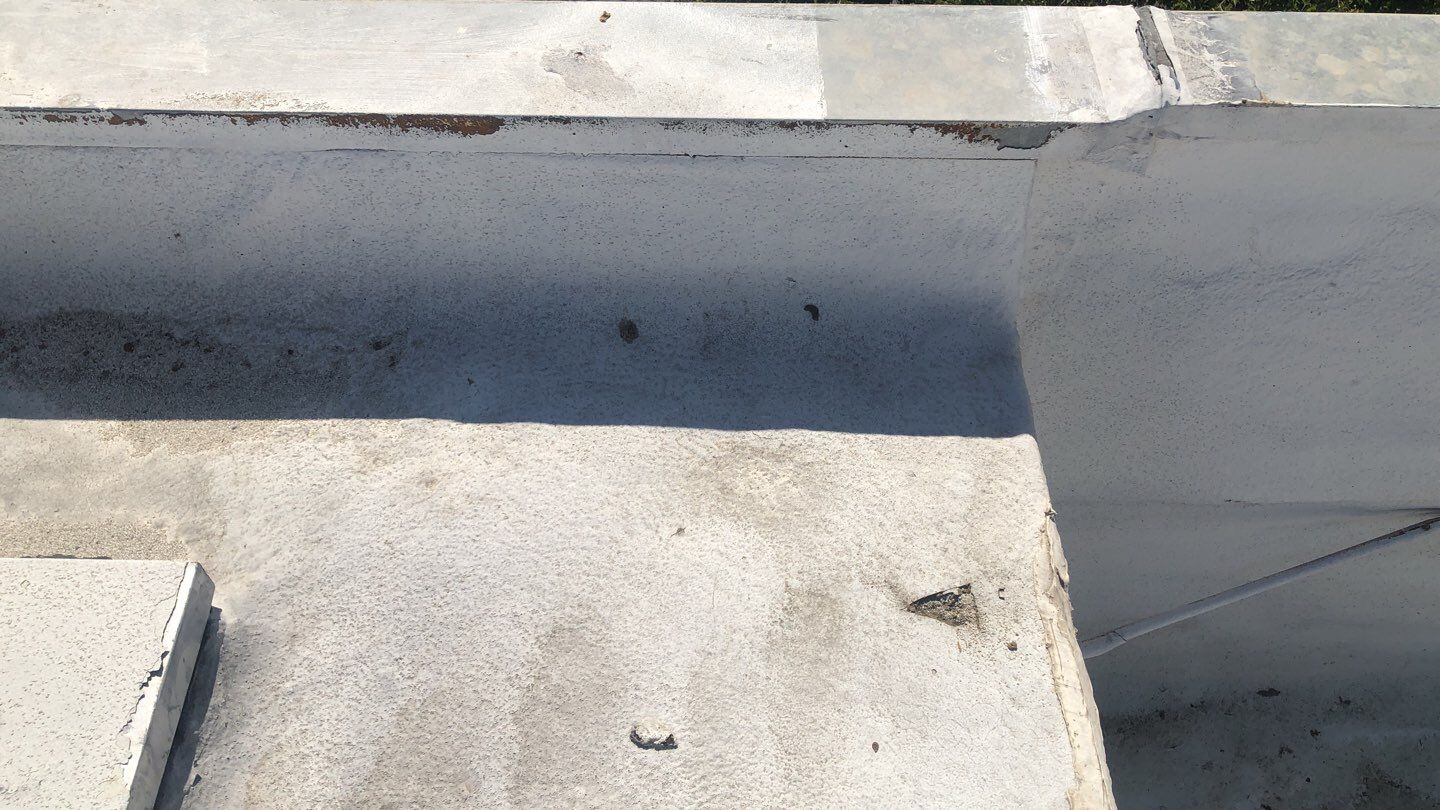 Reburbish existing spray foam job by Straight Edge Roofing Inc