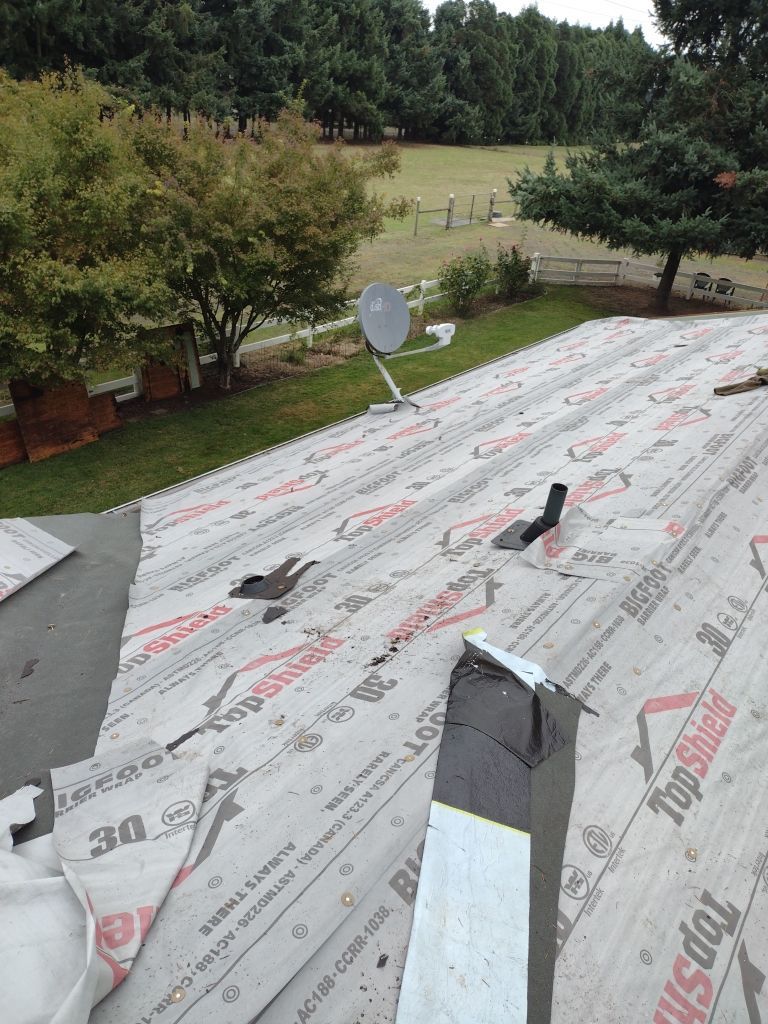 Residential Roofing Installation using IKO Dynasty (Color: Granite Black) by Orezona Building & Roofing Company, Inc.