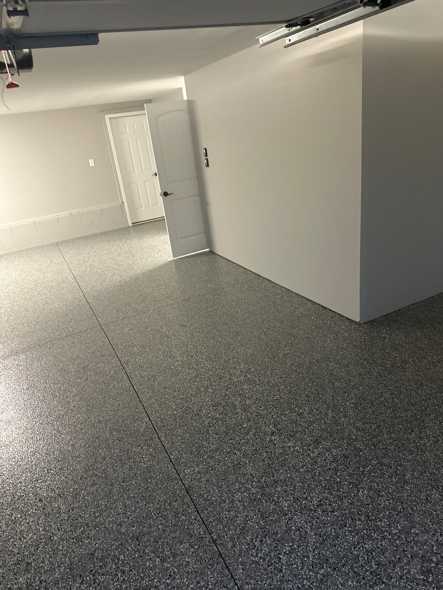 Garage Floor Coating using Wombat by My Garage Floor Guys