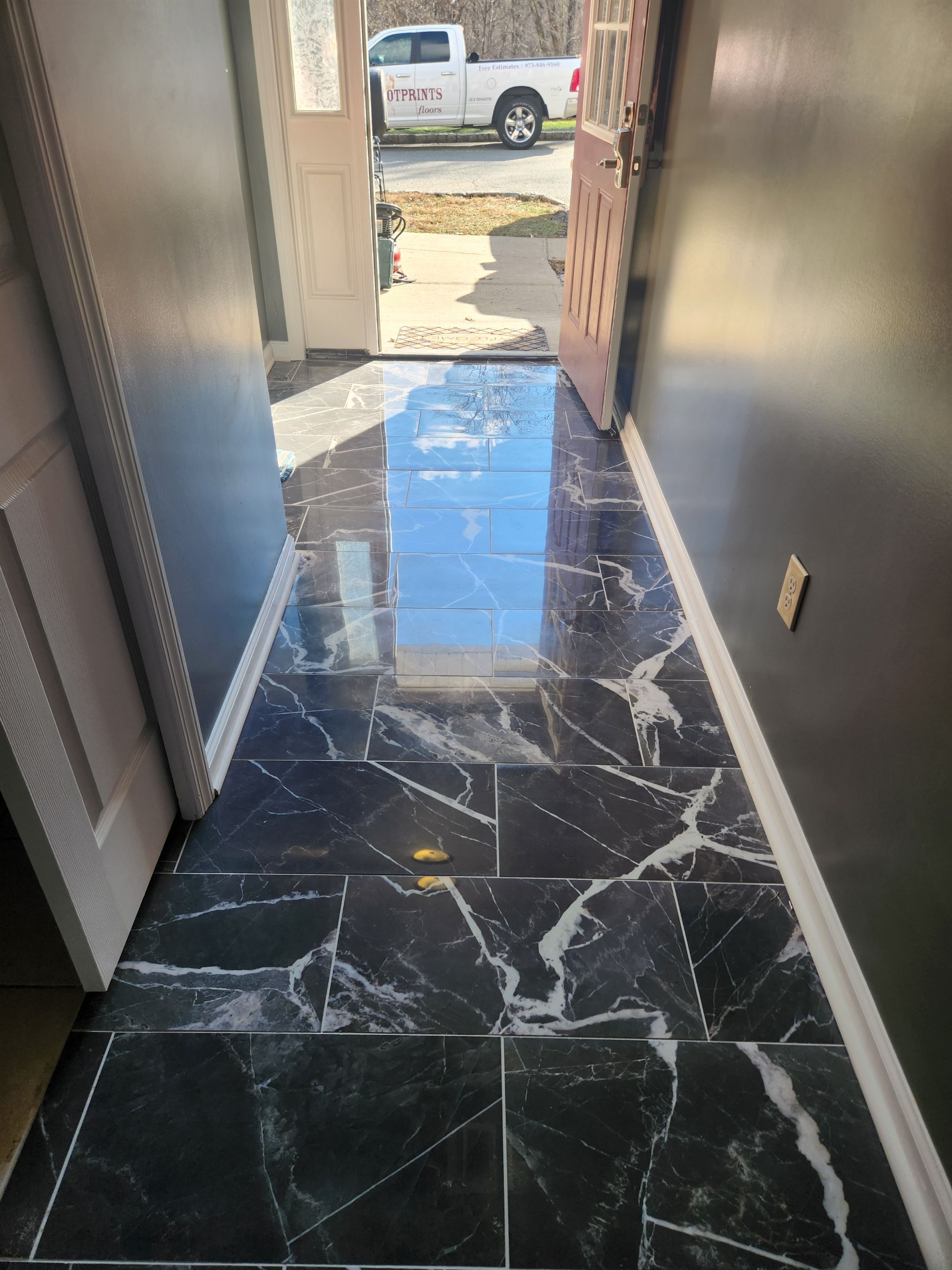 Porceline Tile Floor install using Porceline Tile by Footprints Floors Morristown