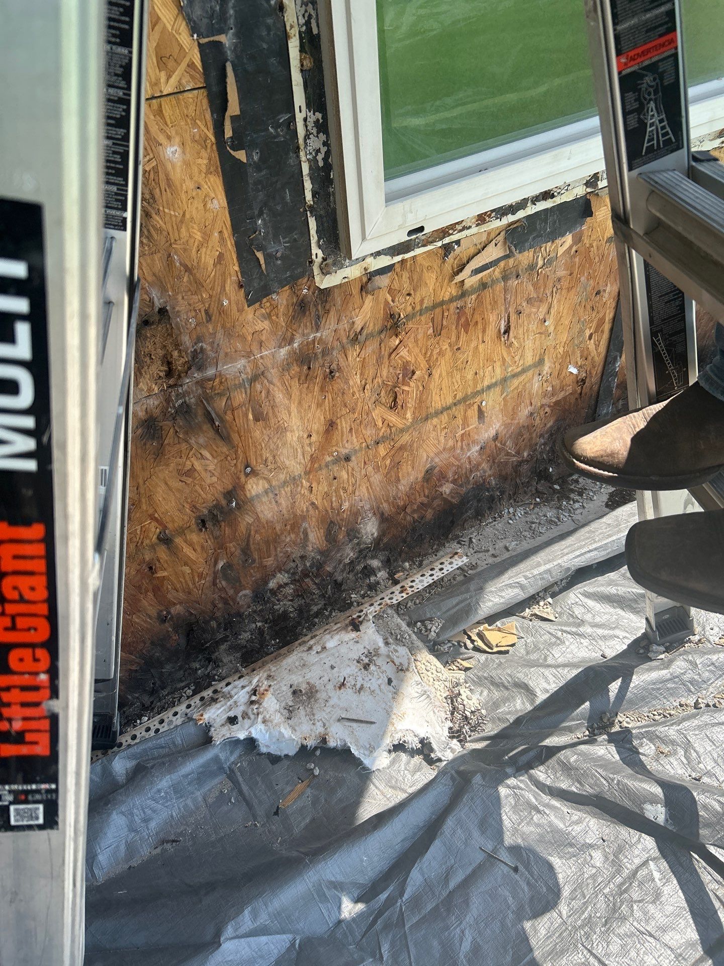 Installing Windows on a Submarine  by Bayfront Roofing and Construction
