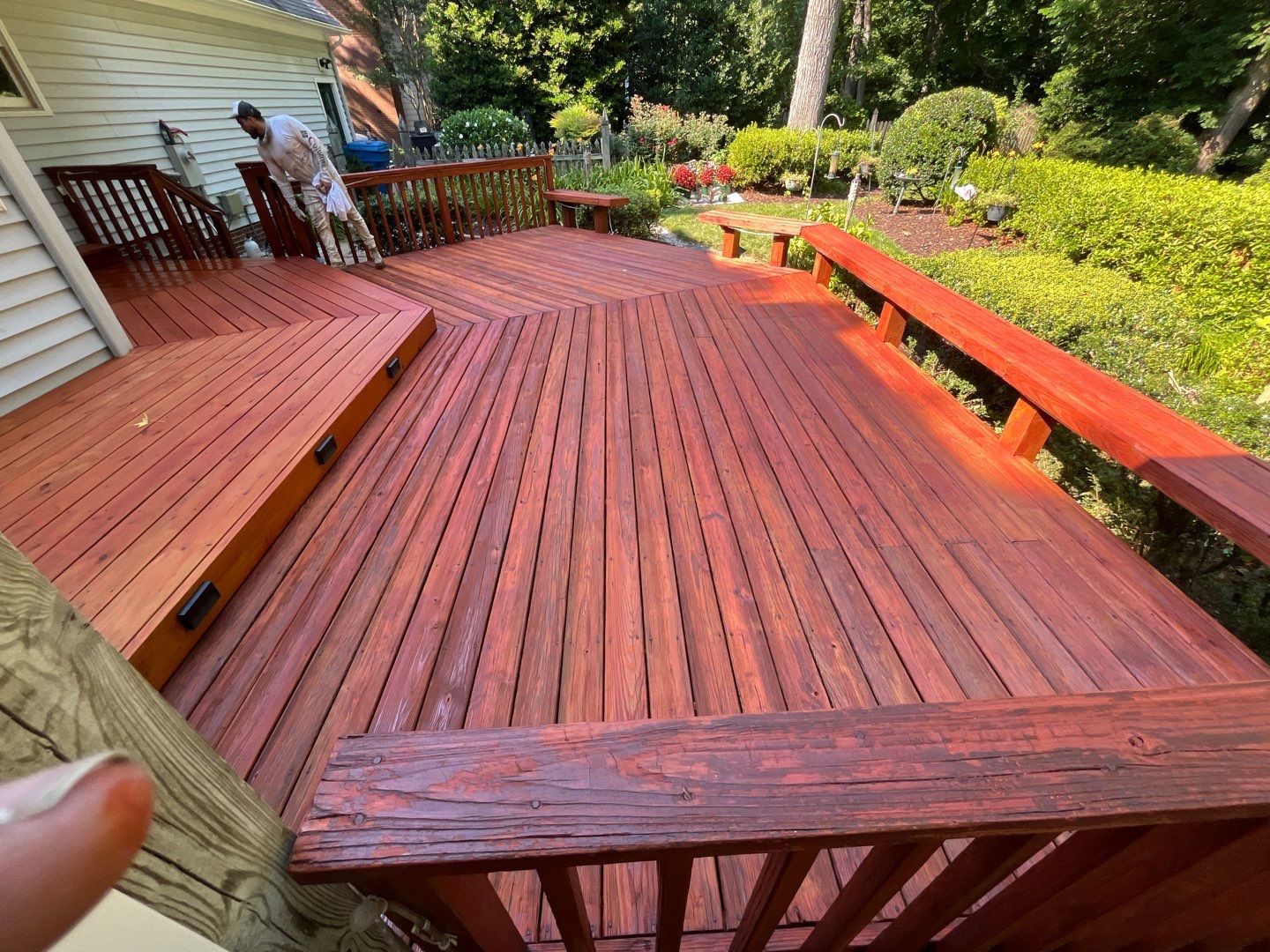 Triple deck re-staining by AKK Painting LLC