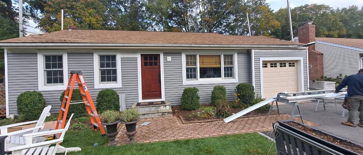 Siding Installation using CertainTeed monogram 4" double 4 Charcoal Gray by A Plus Exterior