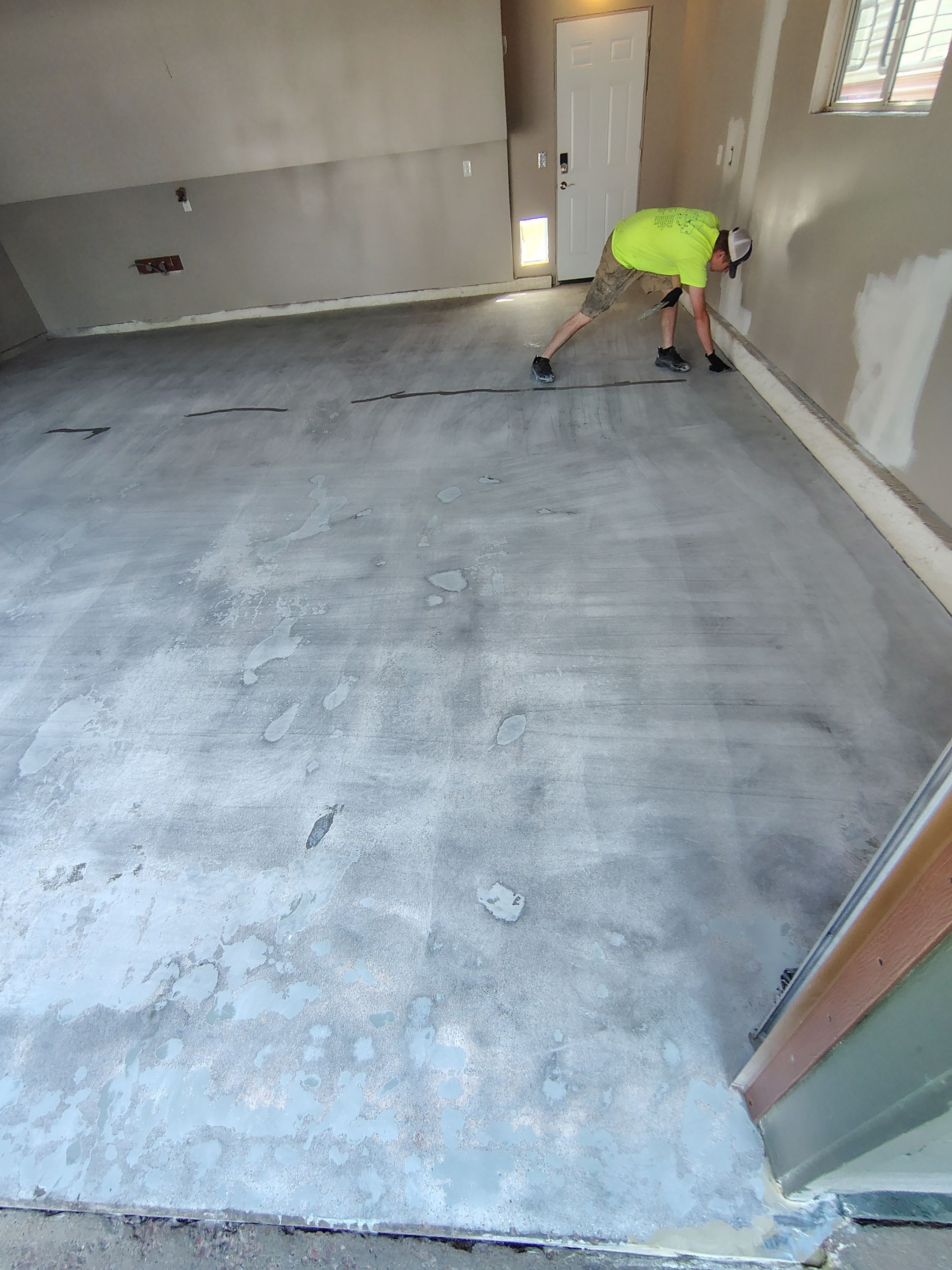 Garage Floor Coating with Decorative Flakes in Tea by Select Painting, Coatings & Garage Cabinets