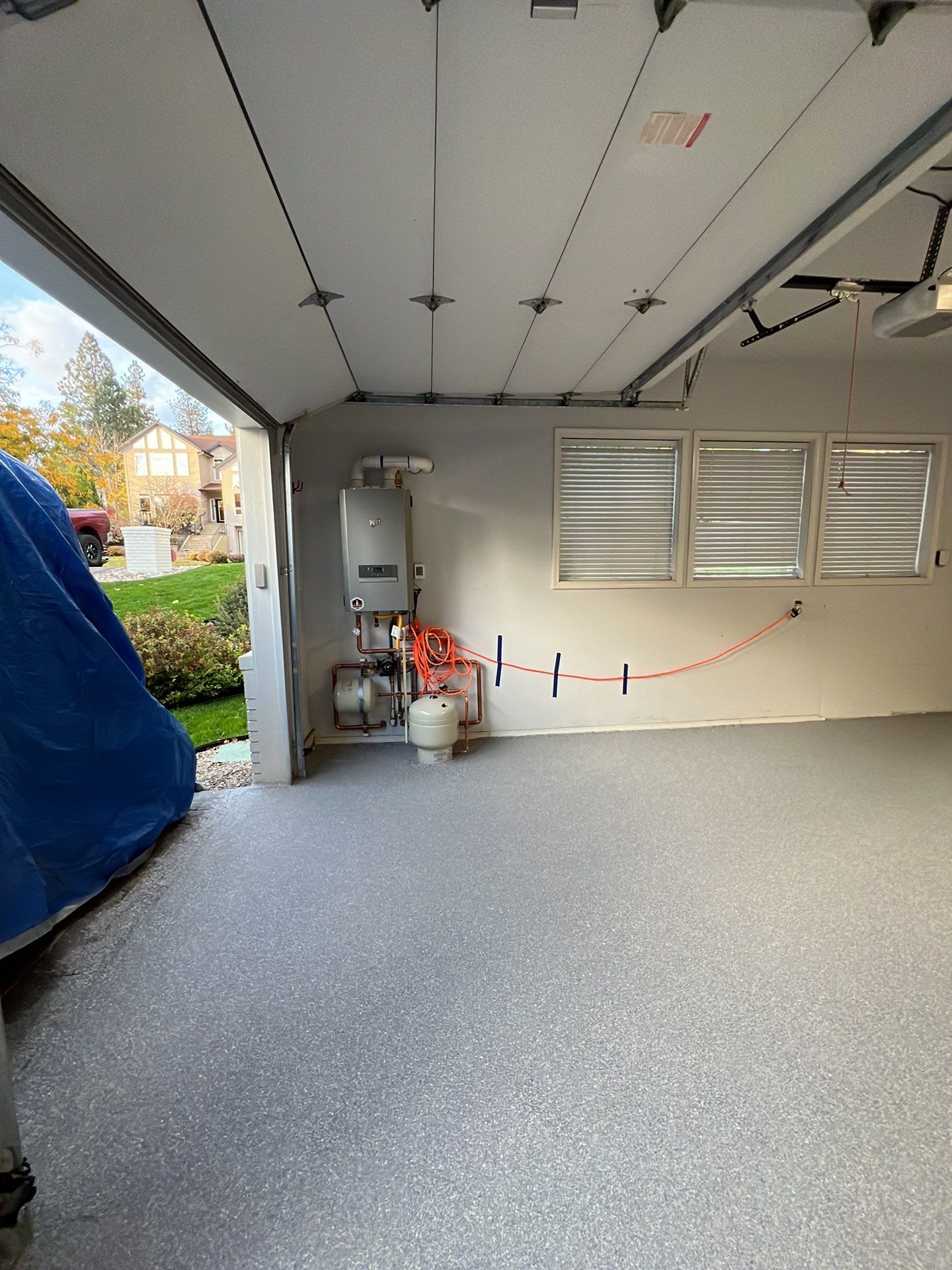 Garage Transformation using Canfield Hybrid & Grey Croc Cabinets by Croc Coatings, LLC