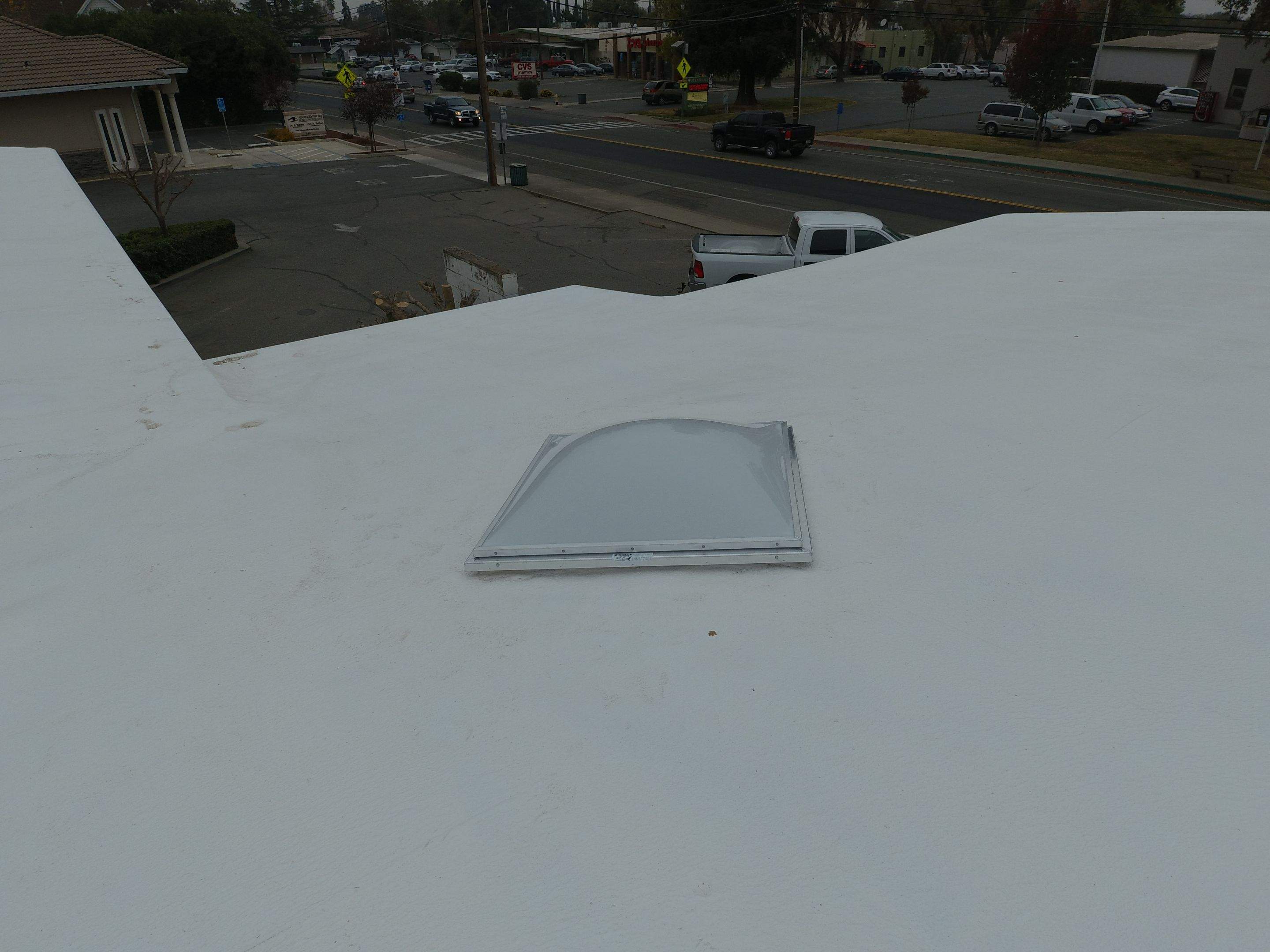 Spray foam and coatings using Conklin Benchmark/PUMA XL coatings and spray foam by Straight Edge Roofing Inc