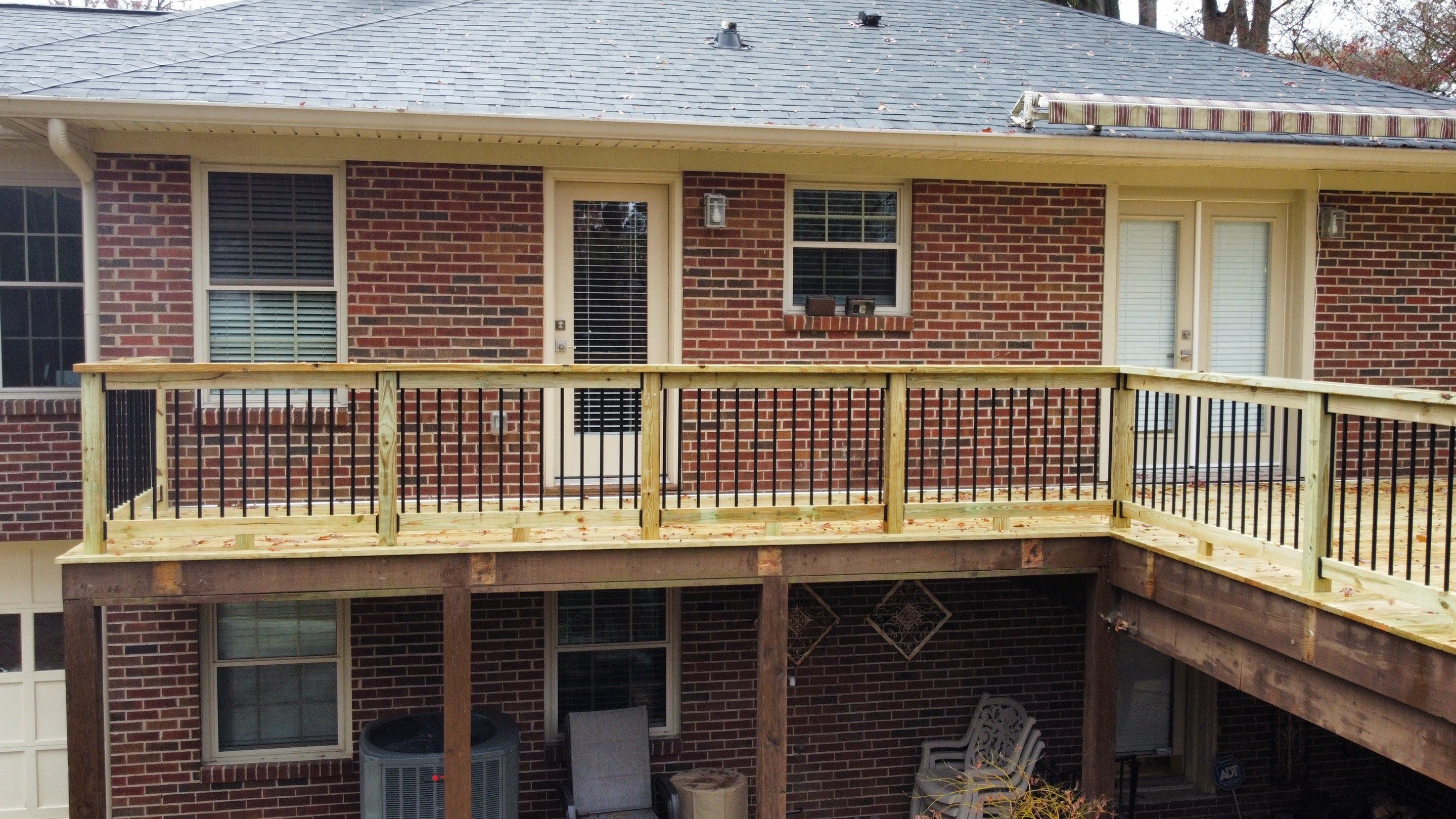 Pressure-Treated Wood Deck Replacement and Garden Bridge in Atlanta by Swift Home Renovations