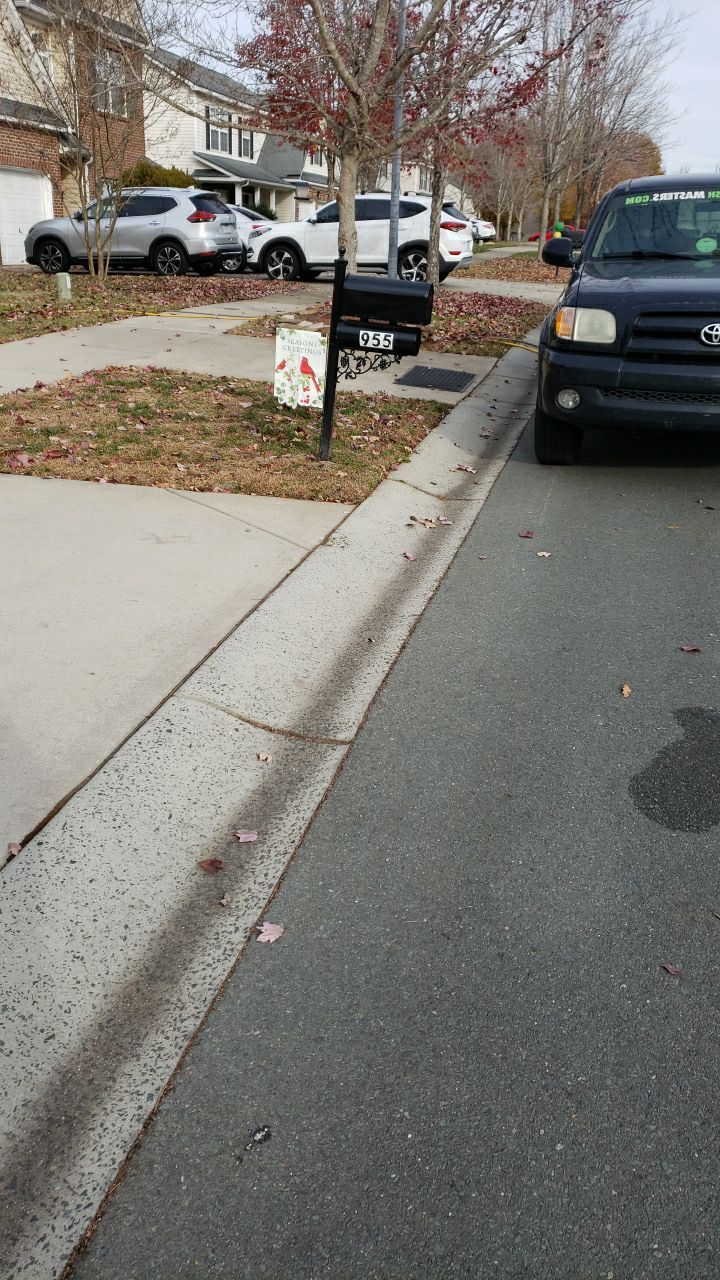 gutters and Driveway by Power Wash Masters LLC