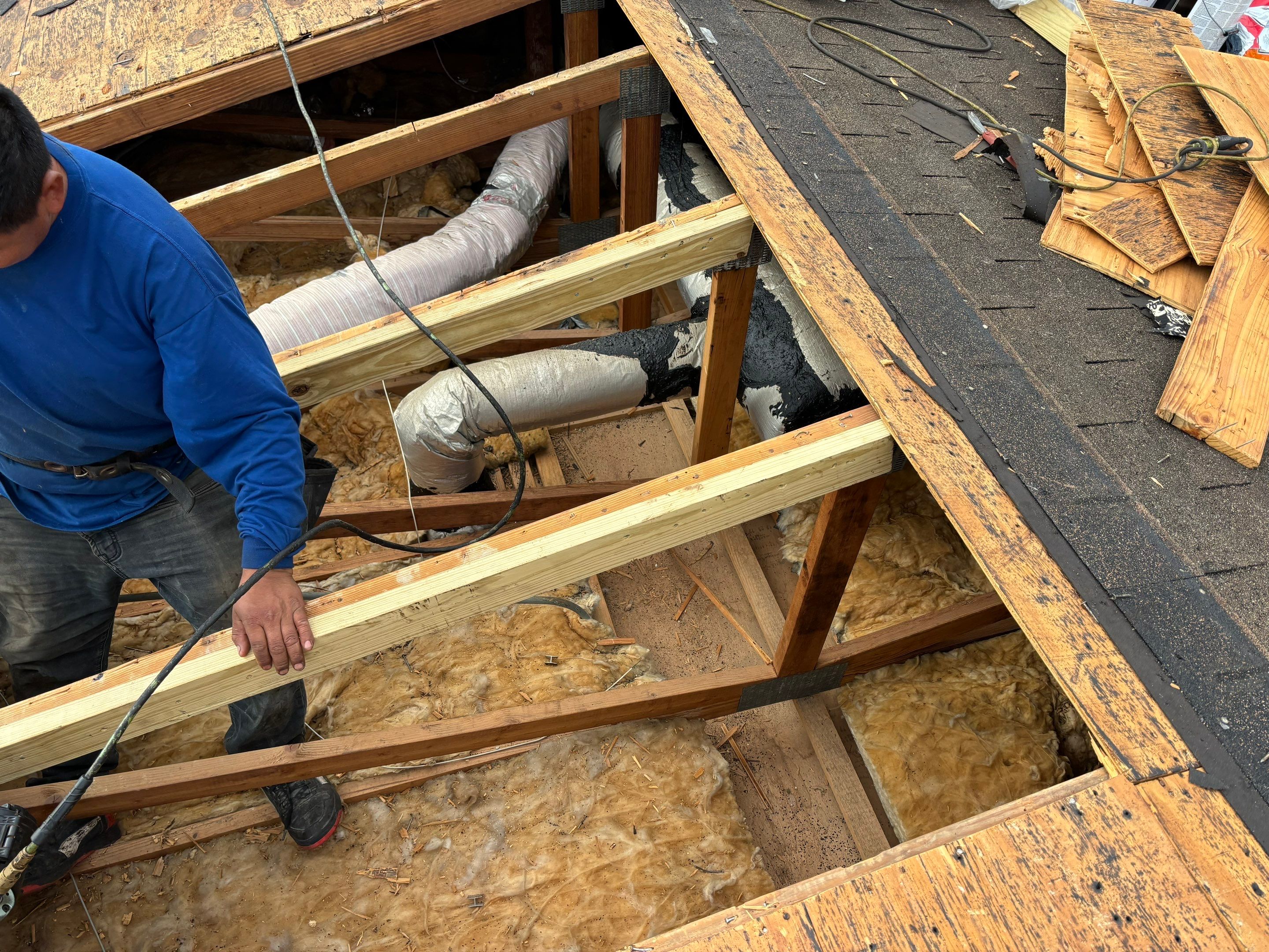 Residential Roofing Installation using Metal Roof  by City Roofing Inc