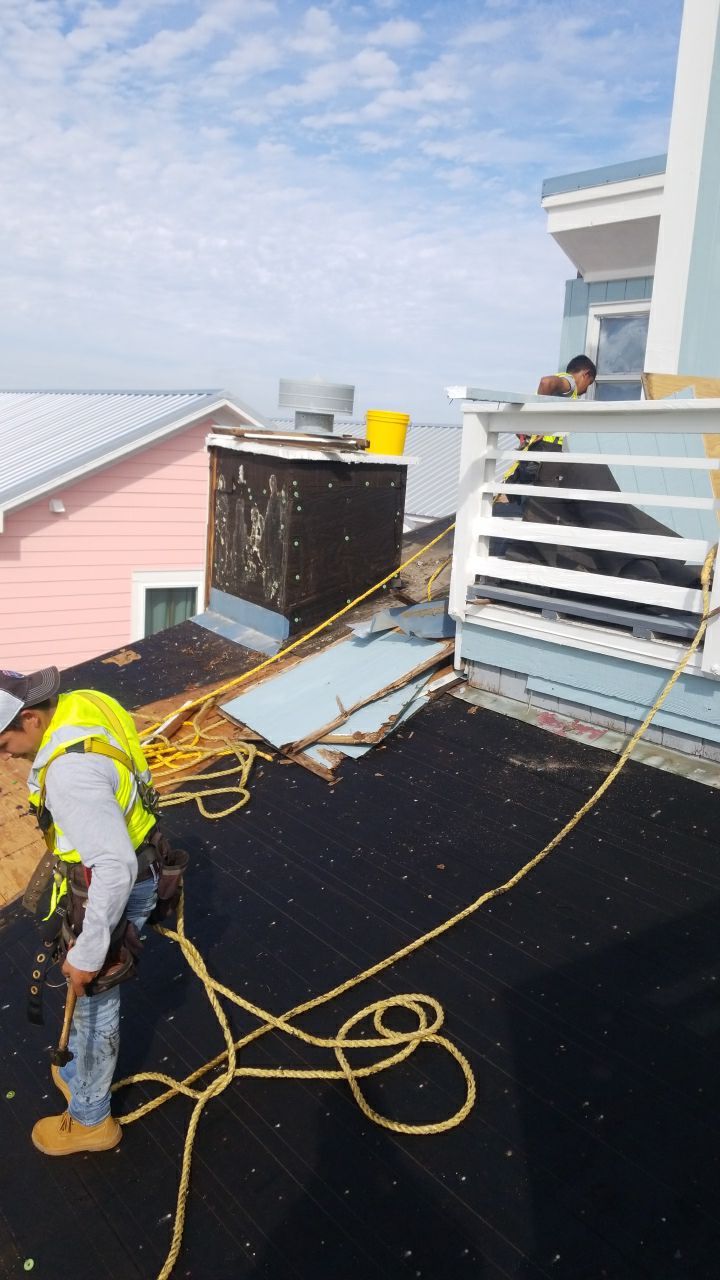 Commercial Roofing Installation using Metal roofing by American Roofing & Construction LLC