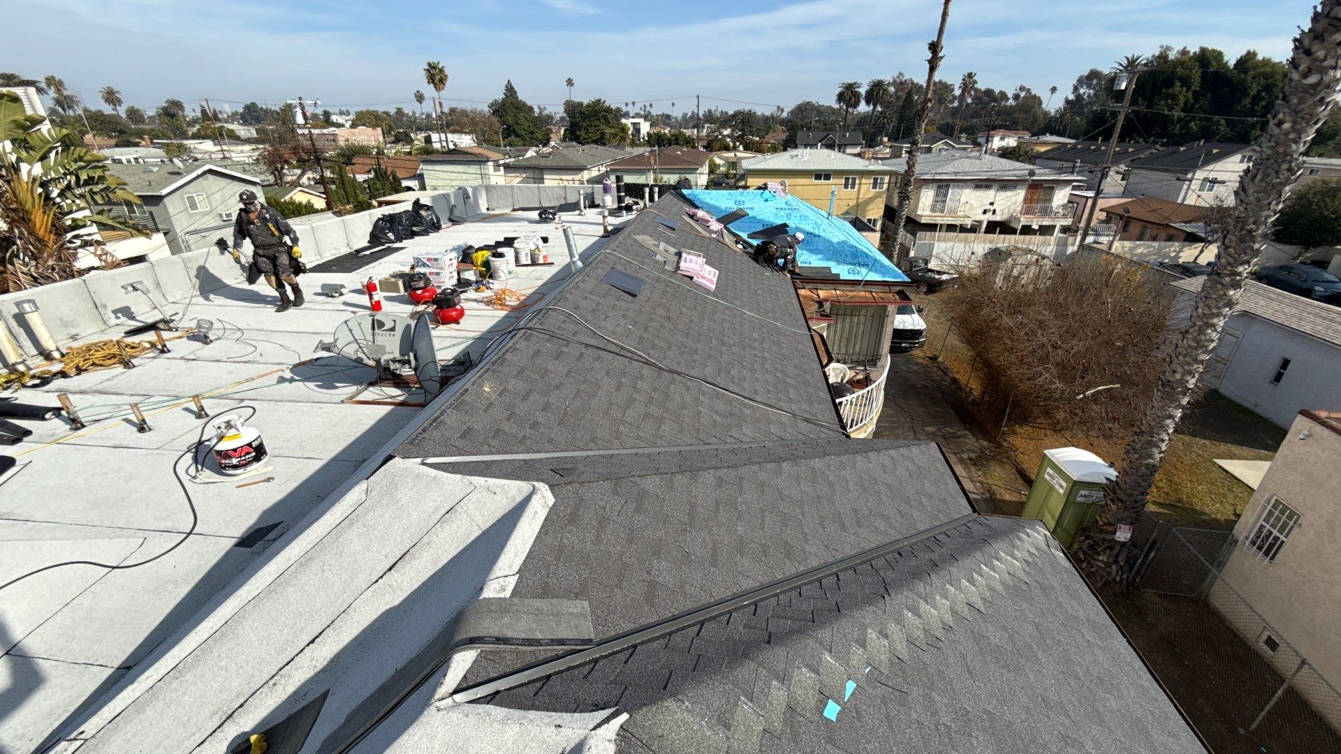 Apartment Building Roofing Installation using CertainTeed GTA Modified Bitument System by Hull Brothers Roofing
