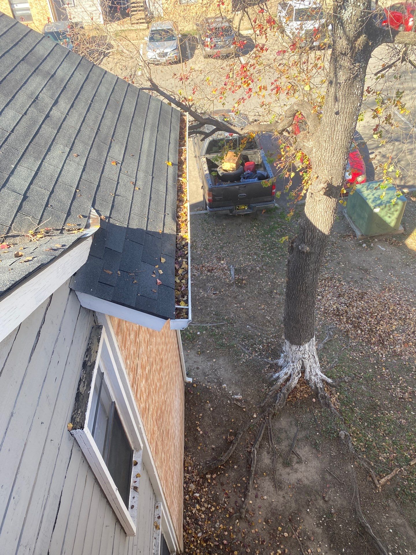 Commercial gutter cleaning San Antonio before photo with filled gutters