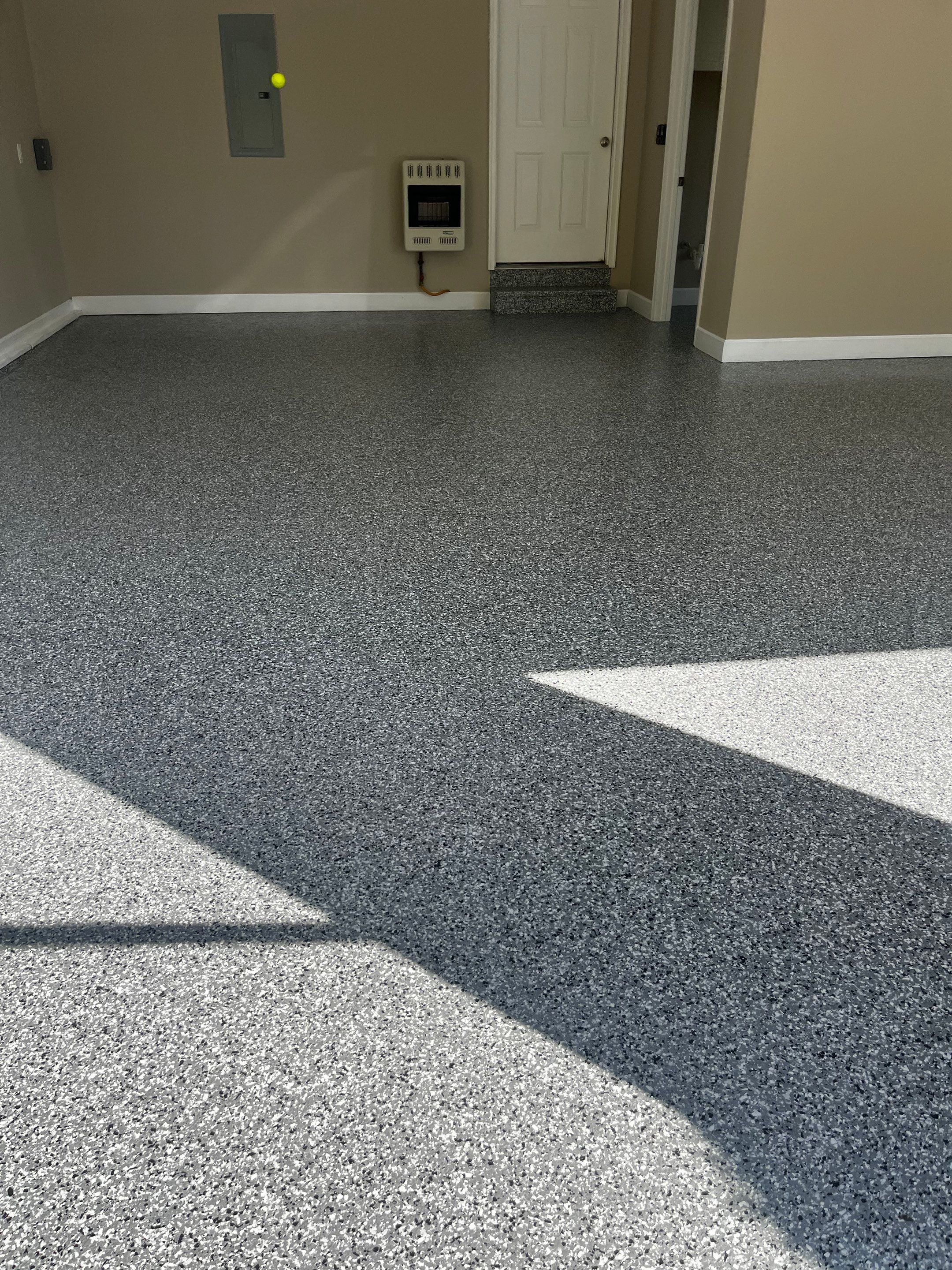 Garage Floor Coating using Wombat by My Garage Floor Guys