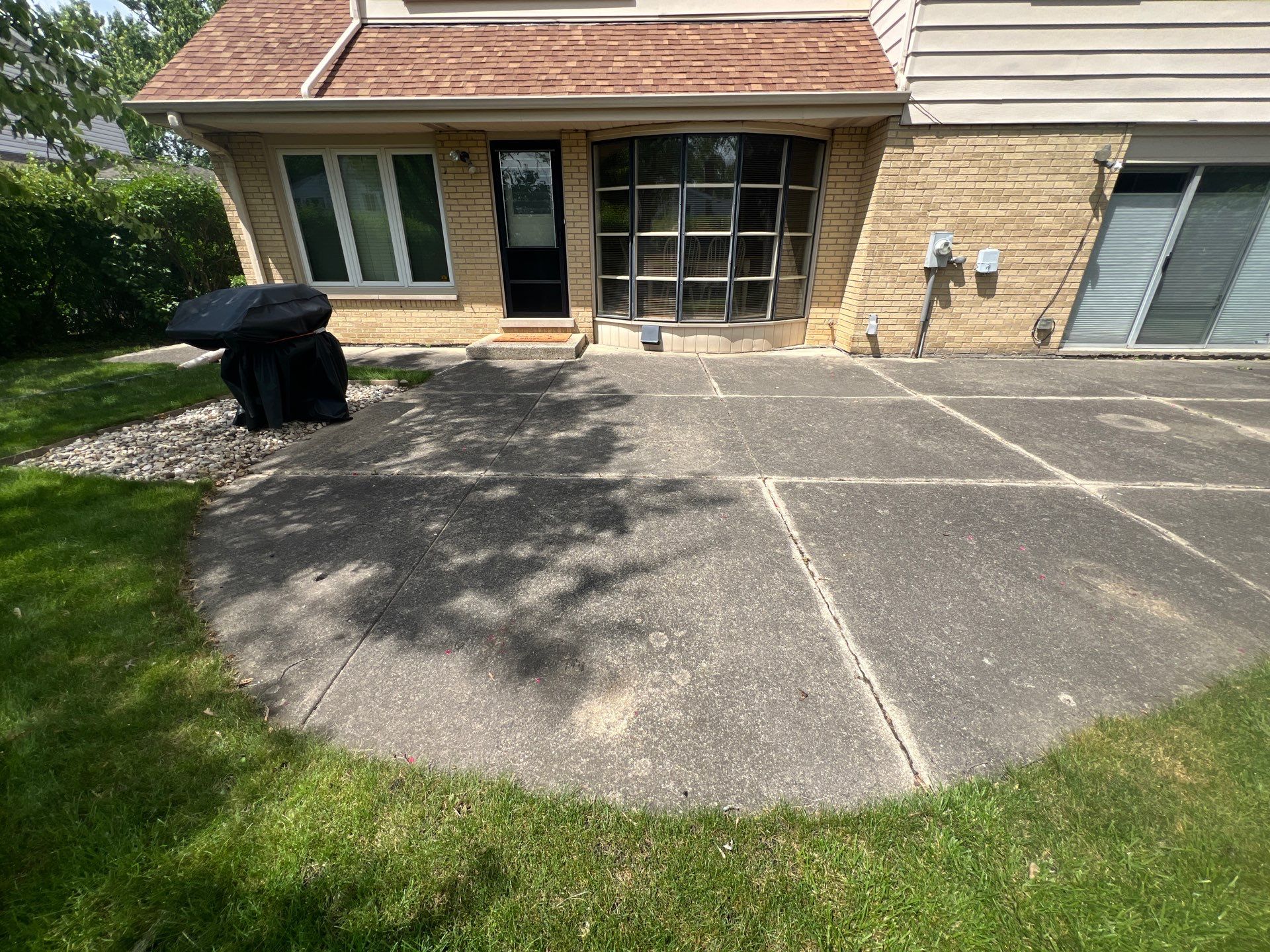concrete patio power washing  by Northern Power Washing LLC.