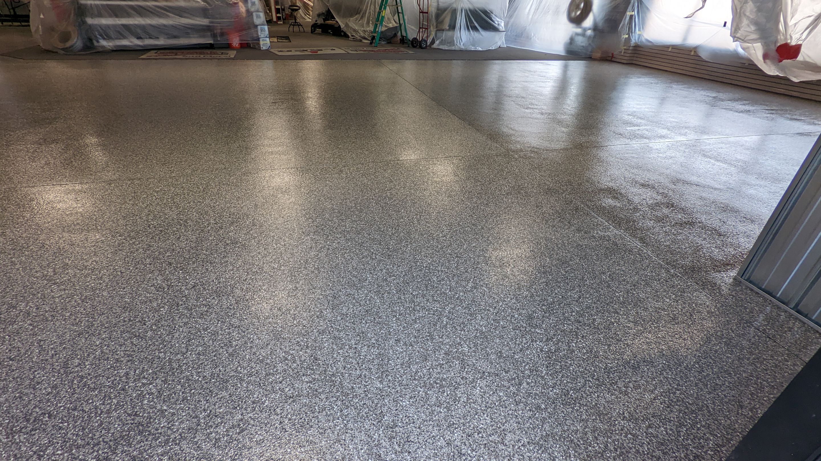 Commercial Showroom Transformation in Silvercreek by Croc Coatings, LLC