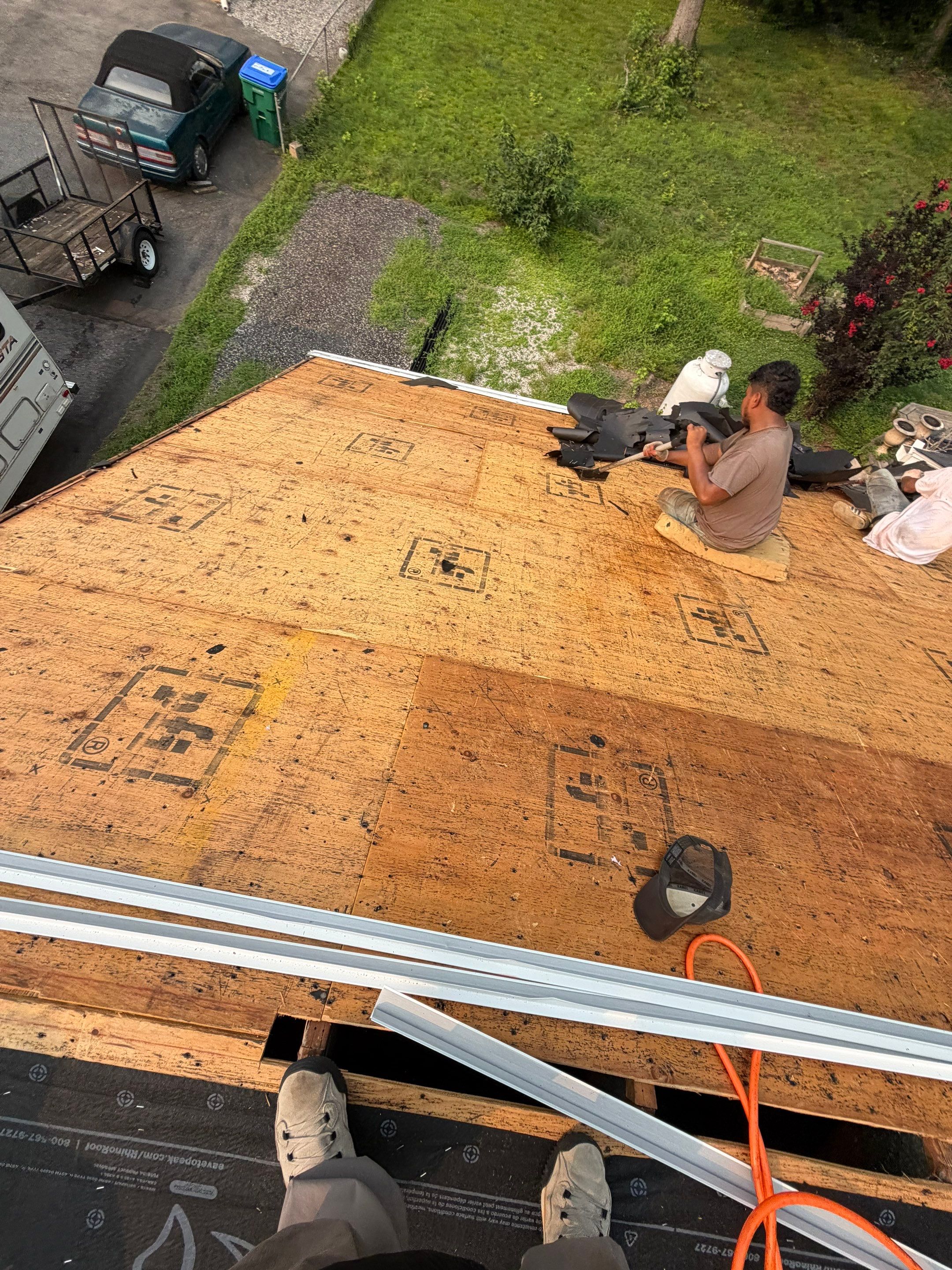 Asphalt Shingle Roof Replacement and Gutter Installation in Richmond by Cade Construction