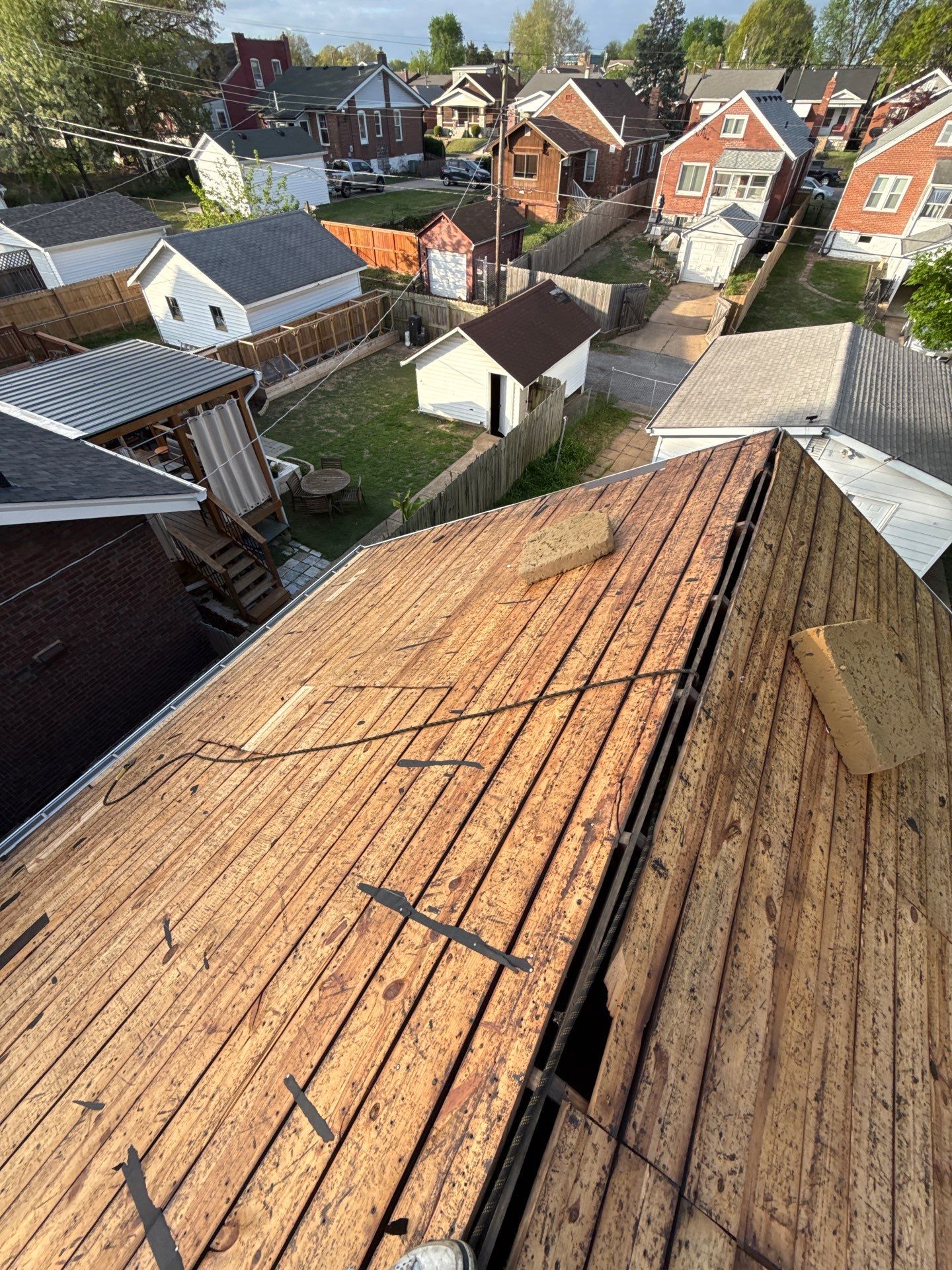Full Residential Roof Installation and Detached Garage Shingle Replacement in St. Louis by Acute Roofing And Exteriors 