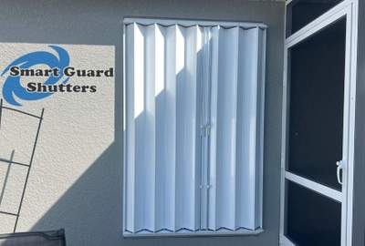 Accordion Shutters in White