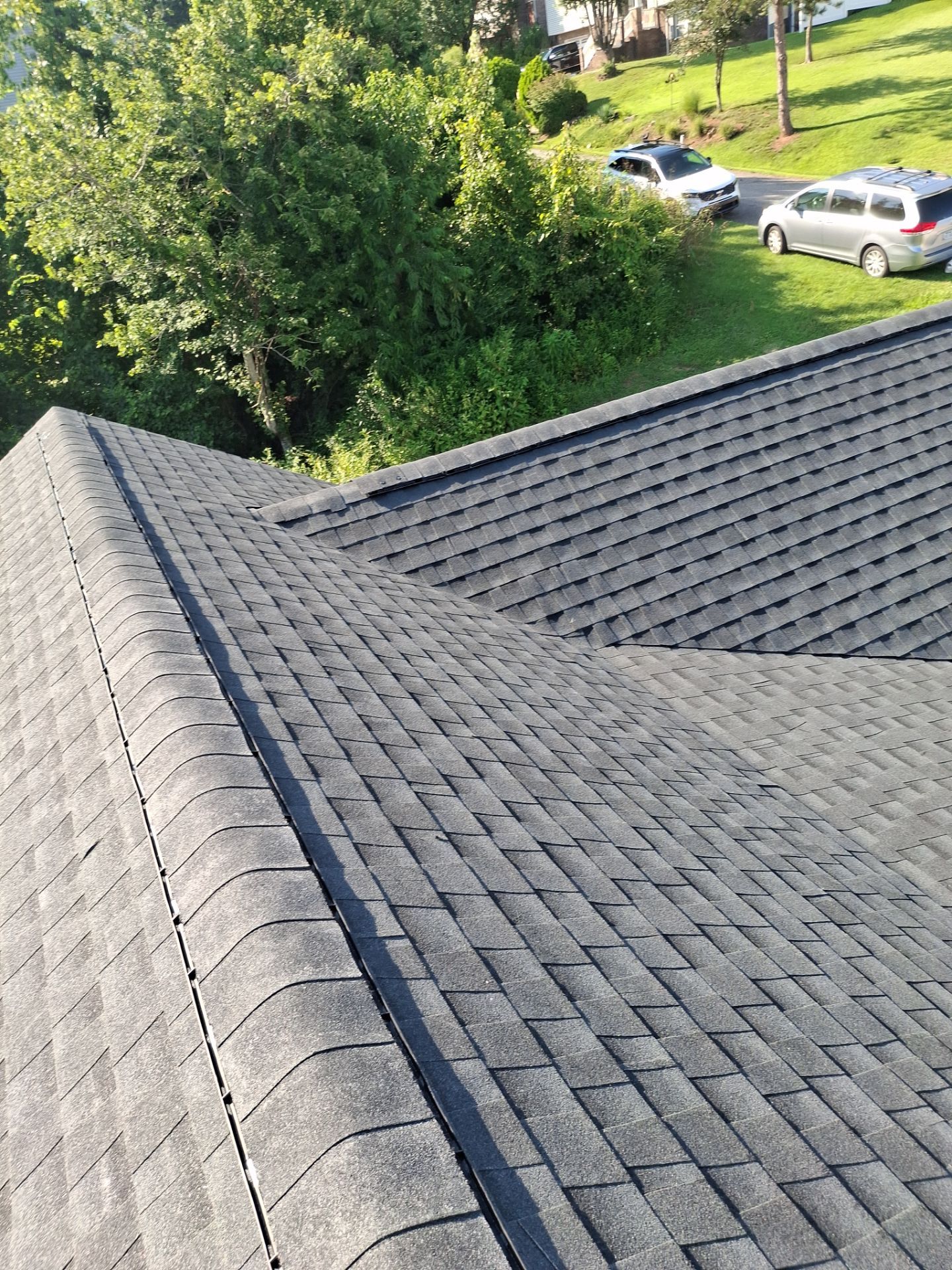 Residential Roofing Installation using GAF Timberline HDZ Charcoal by Rainstoppers Roofing