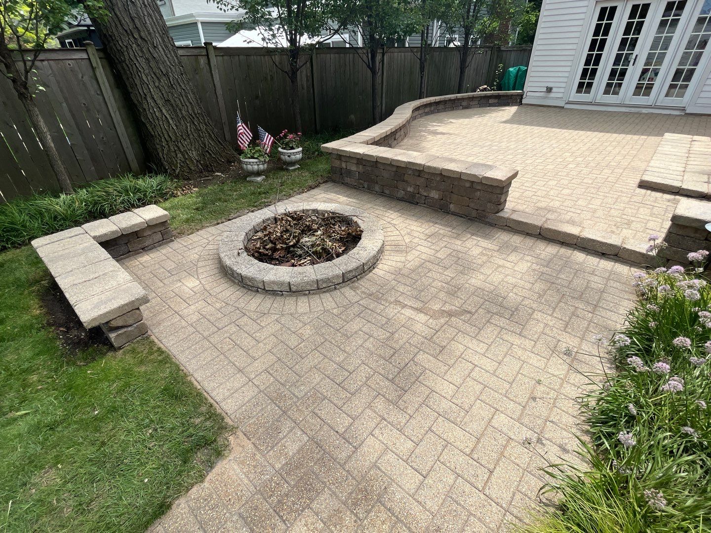 Brick patio repair, clean sand and seal by Northern Power Washing LLC.