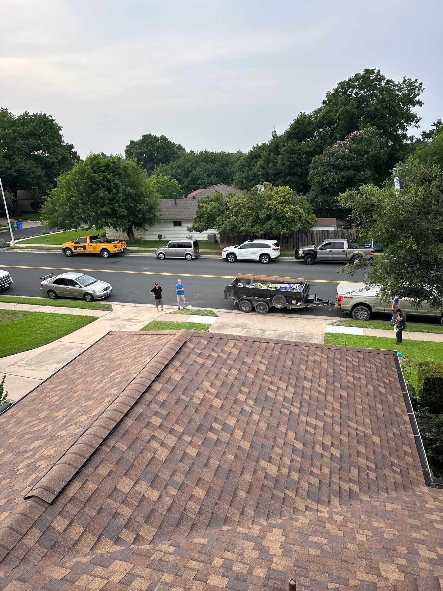 Residential Roofing Installation using Owens Corning TruDef Desert Rose by DeZign Roofing & Exteriors