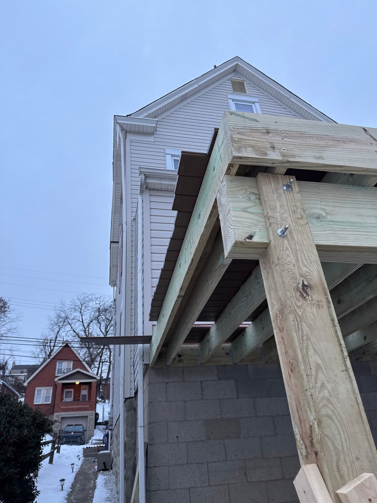 Deck and door by Cousins Roofing Siding & Decks