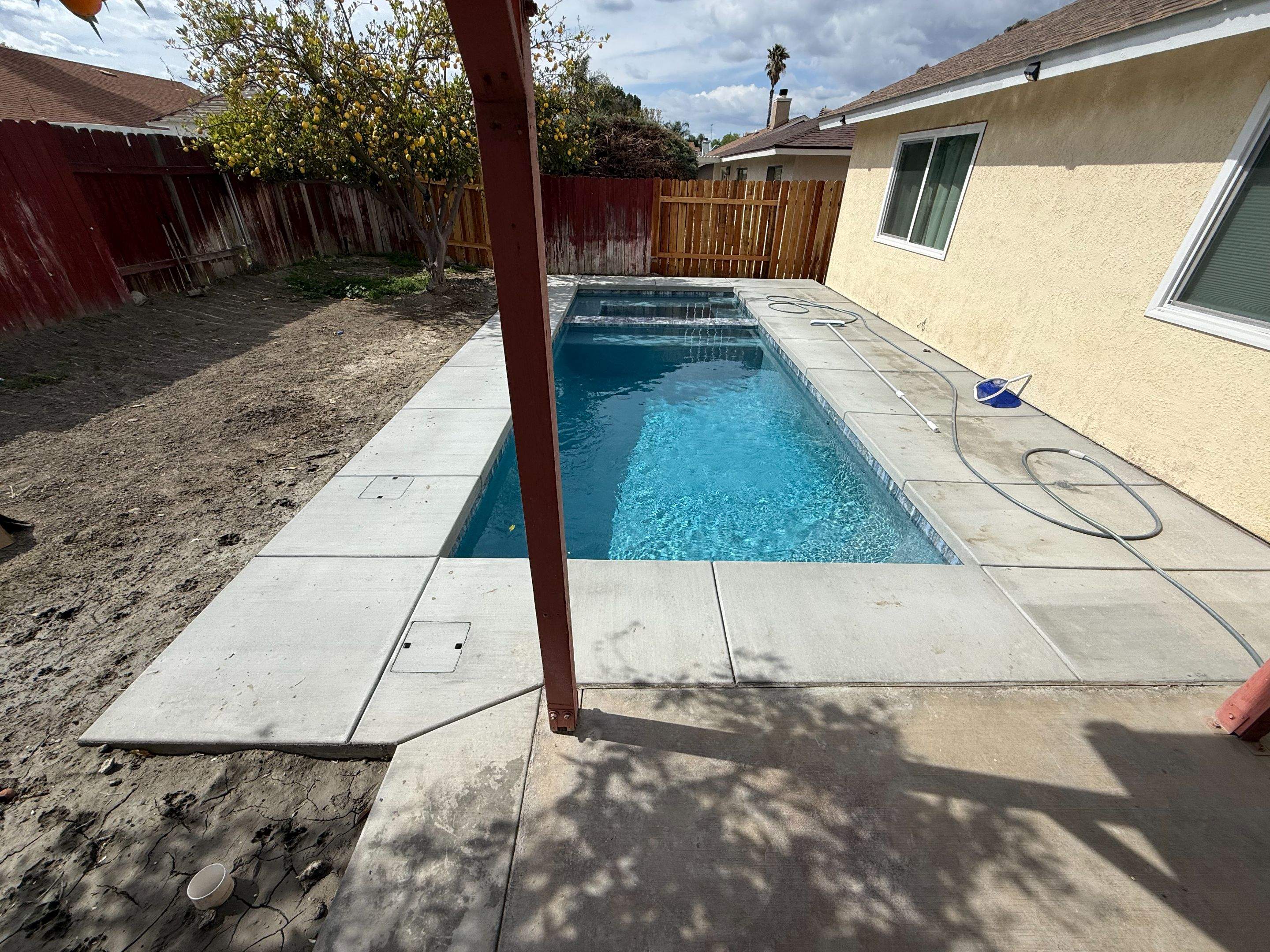 Small space pool and spa by Premier Pools and Spas Temecula