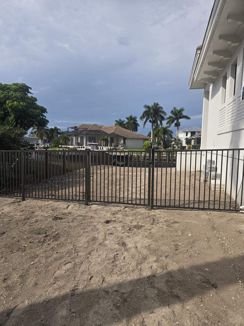 Bronze Aluminum Fence and Cable Railing in Marco Island by True Fence LLC